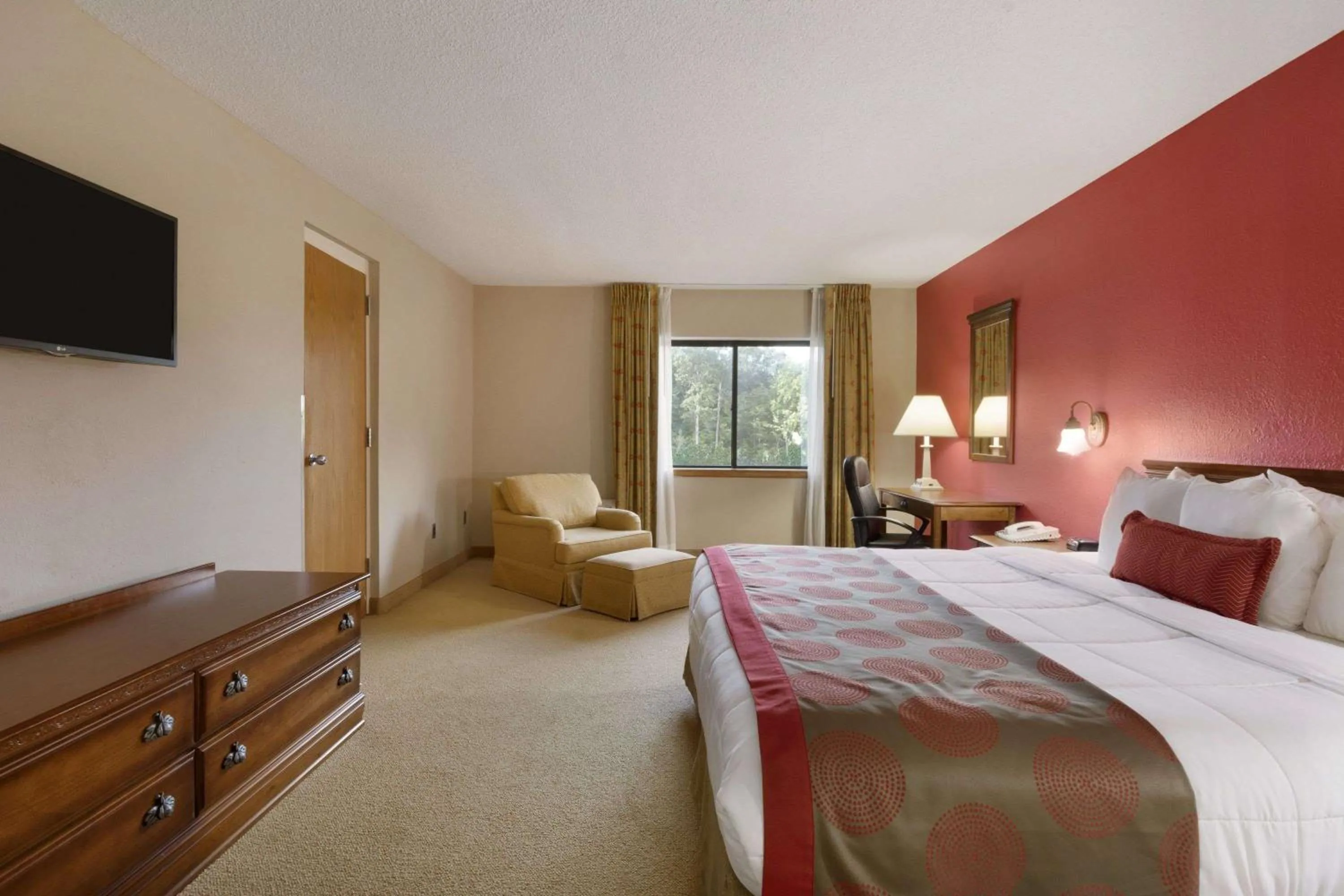 Photo of the whole room, Bed in Ramada by Wyndham Raleigh