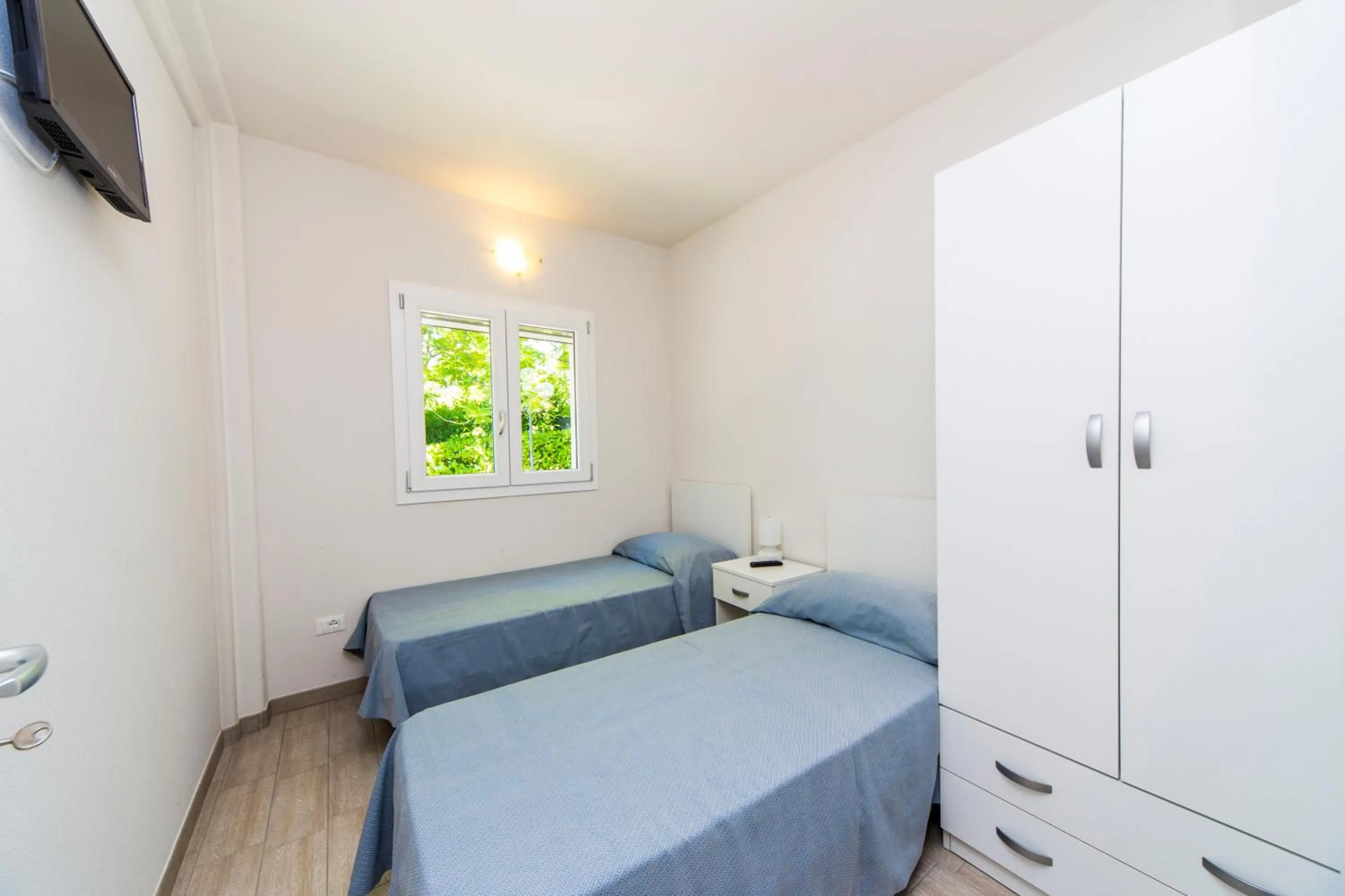 Photo of the whole room, Bed in Villaggio La Pescaccia