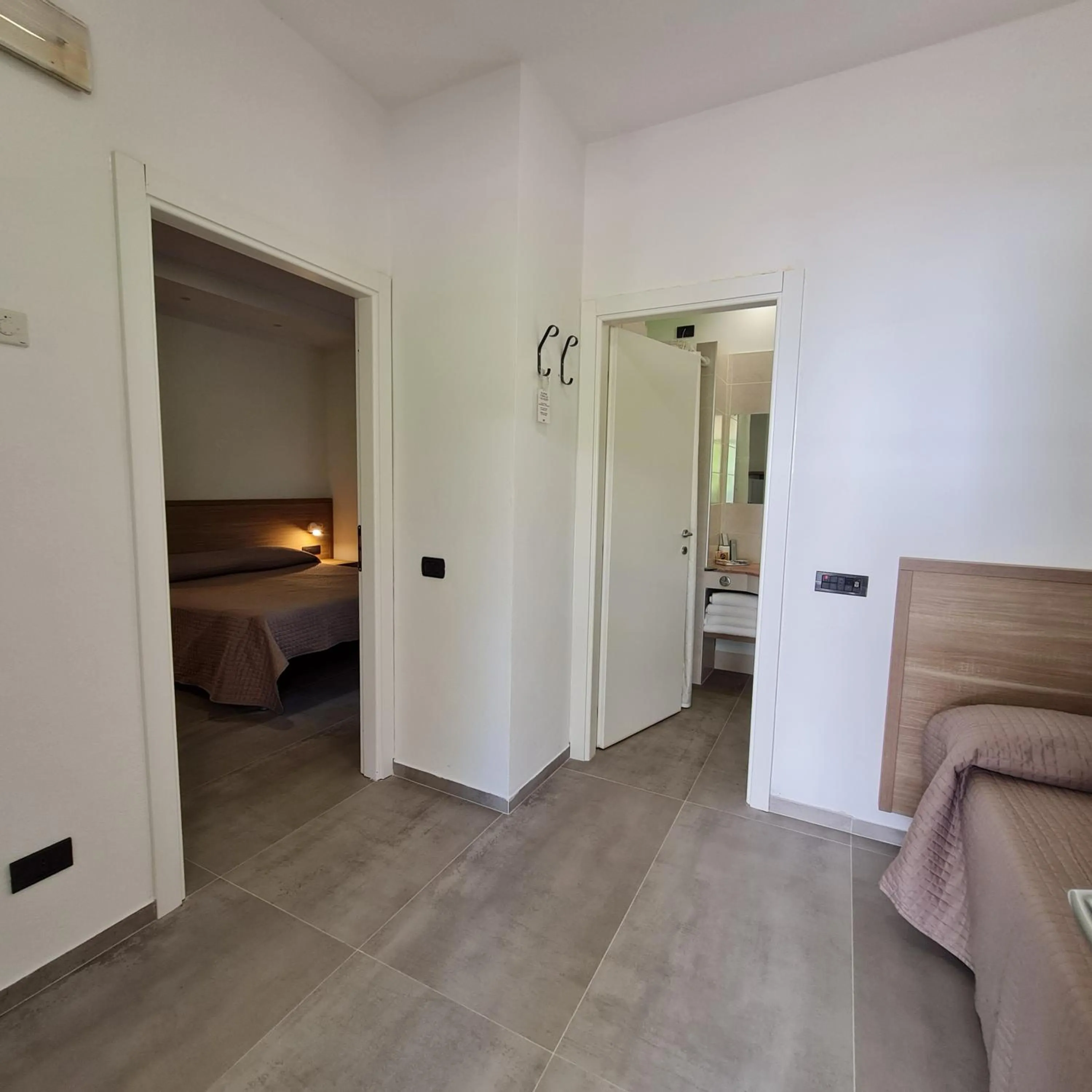 Bathroom, Bed in Villaggio La Pescaccia