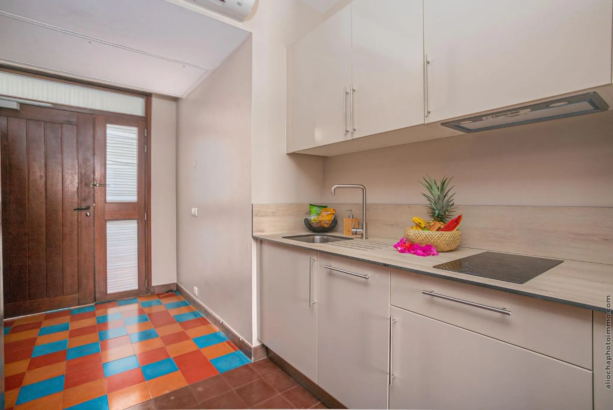 Kitchen or kitchenette in Les Villas du Lagon