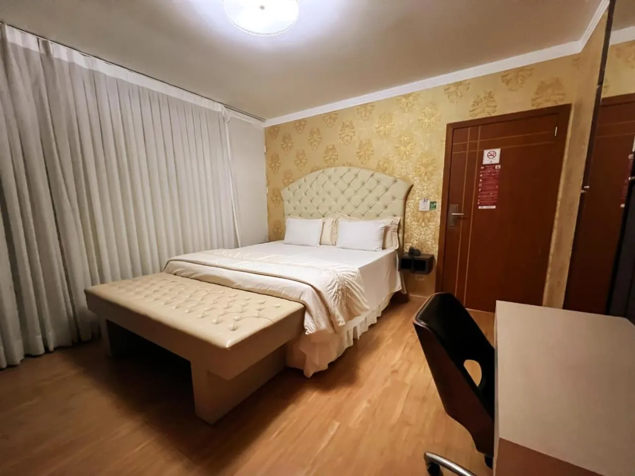 Bed in Paraná Comfort Hotel