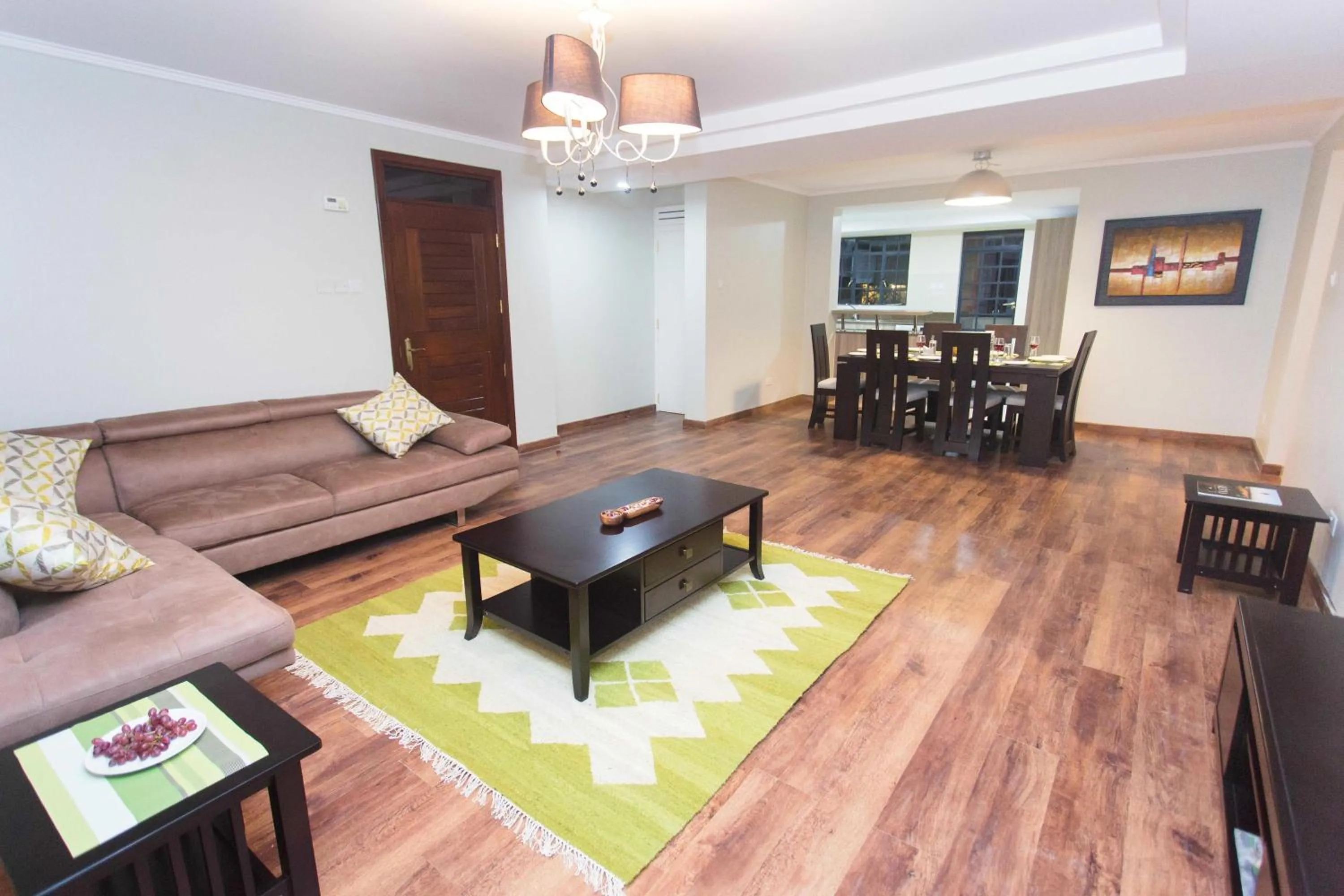 Living room in Cozy Residences by Trianum