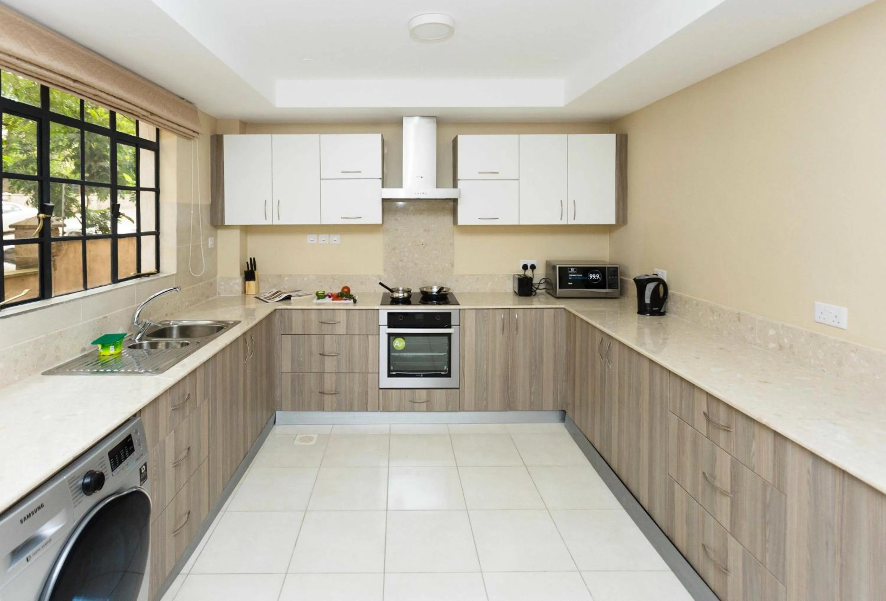 Kitchen or kitchenette in Cozy Residences by Trianum