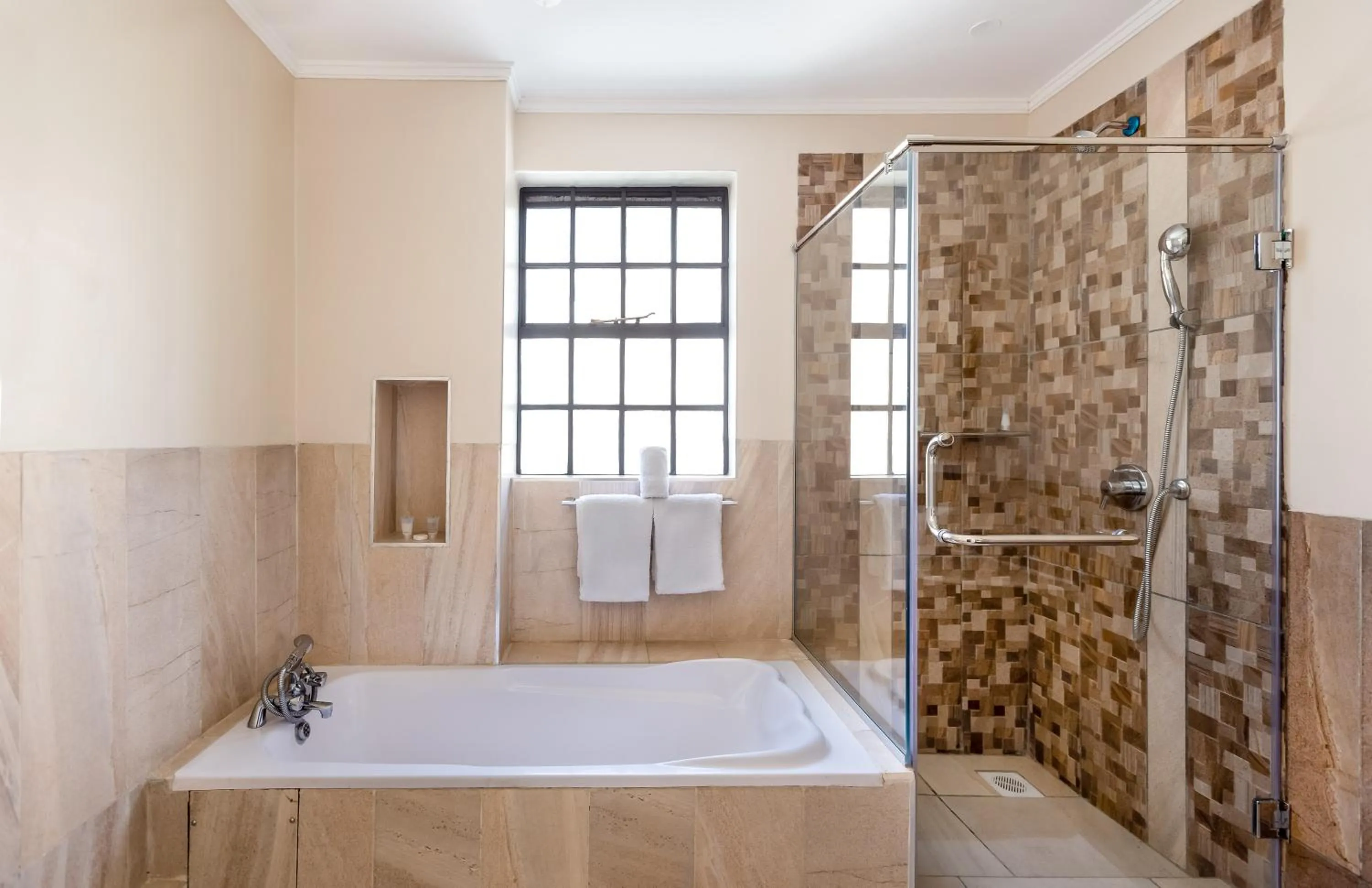 Bathroom in Cozy Residences by Trianum