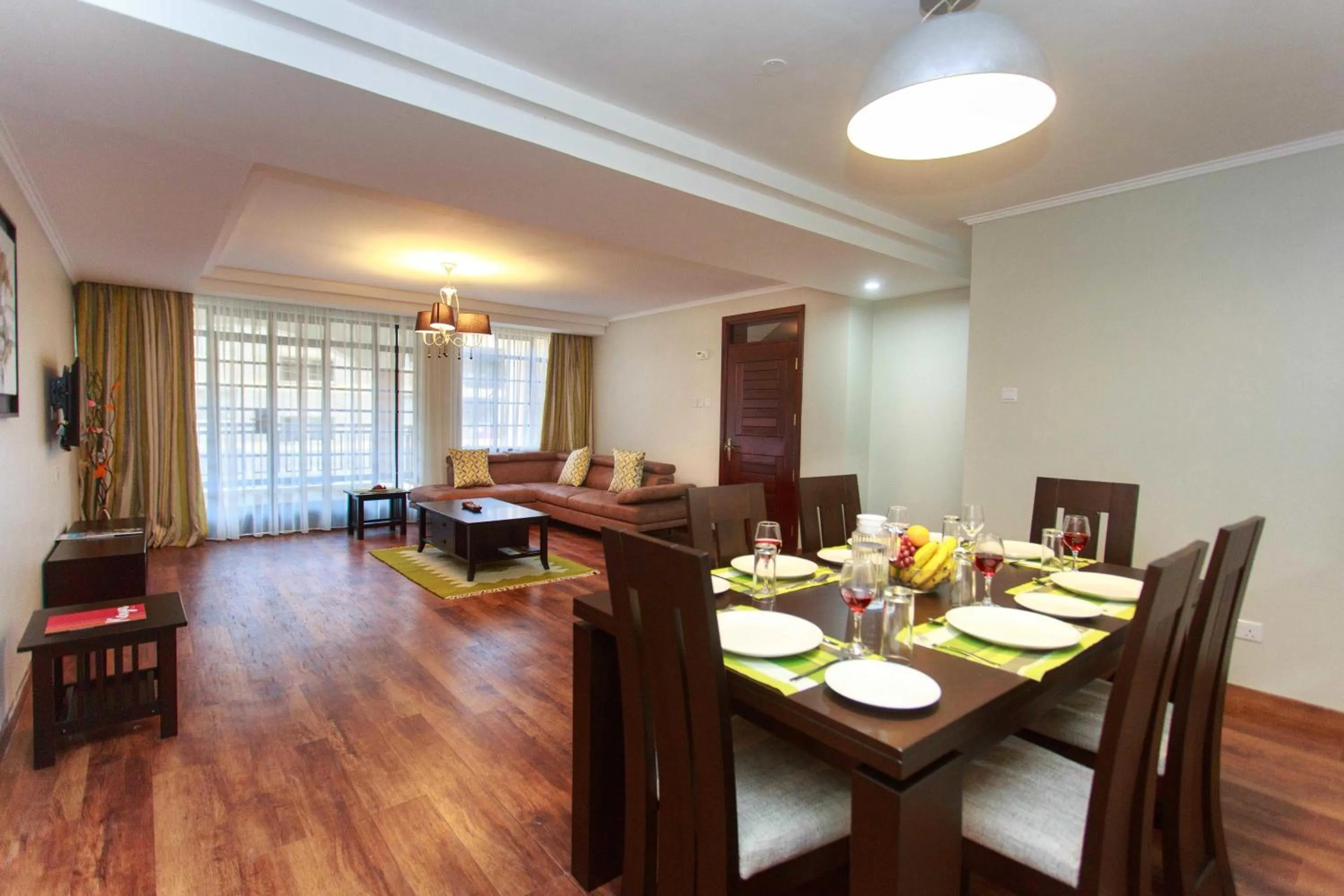 Living room in Cozy Residences by Trianum