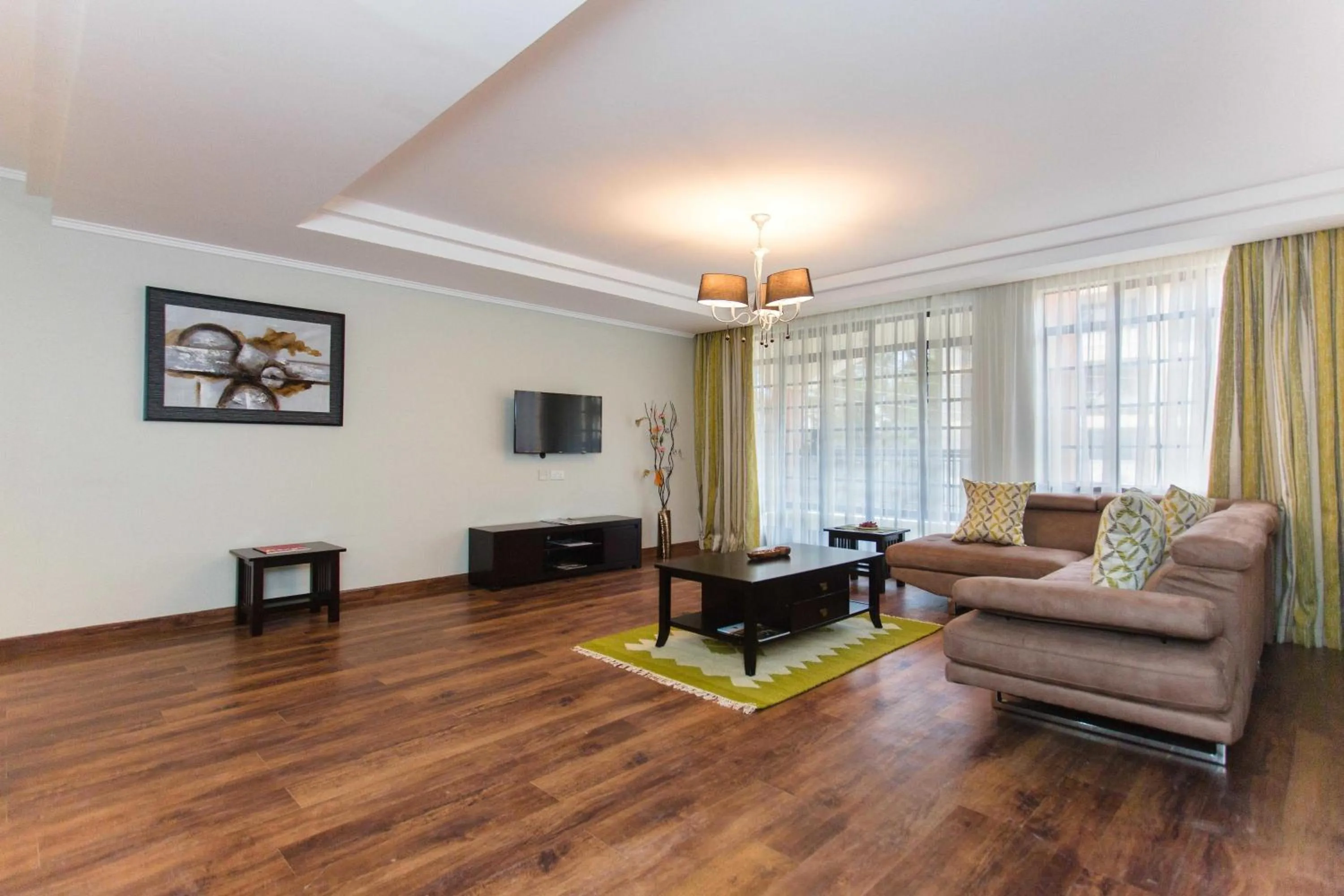 Seating area in Cozy Residences by Trianum