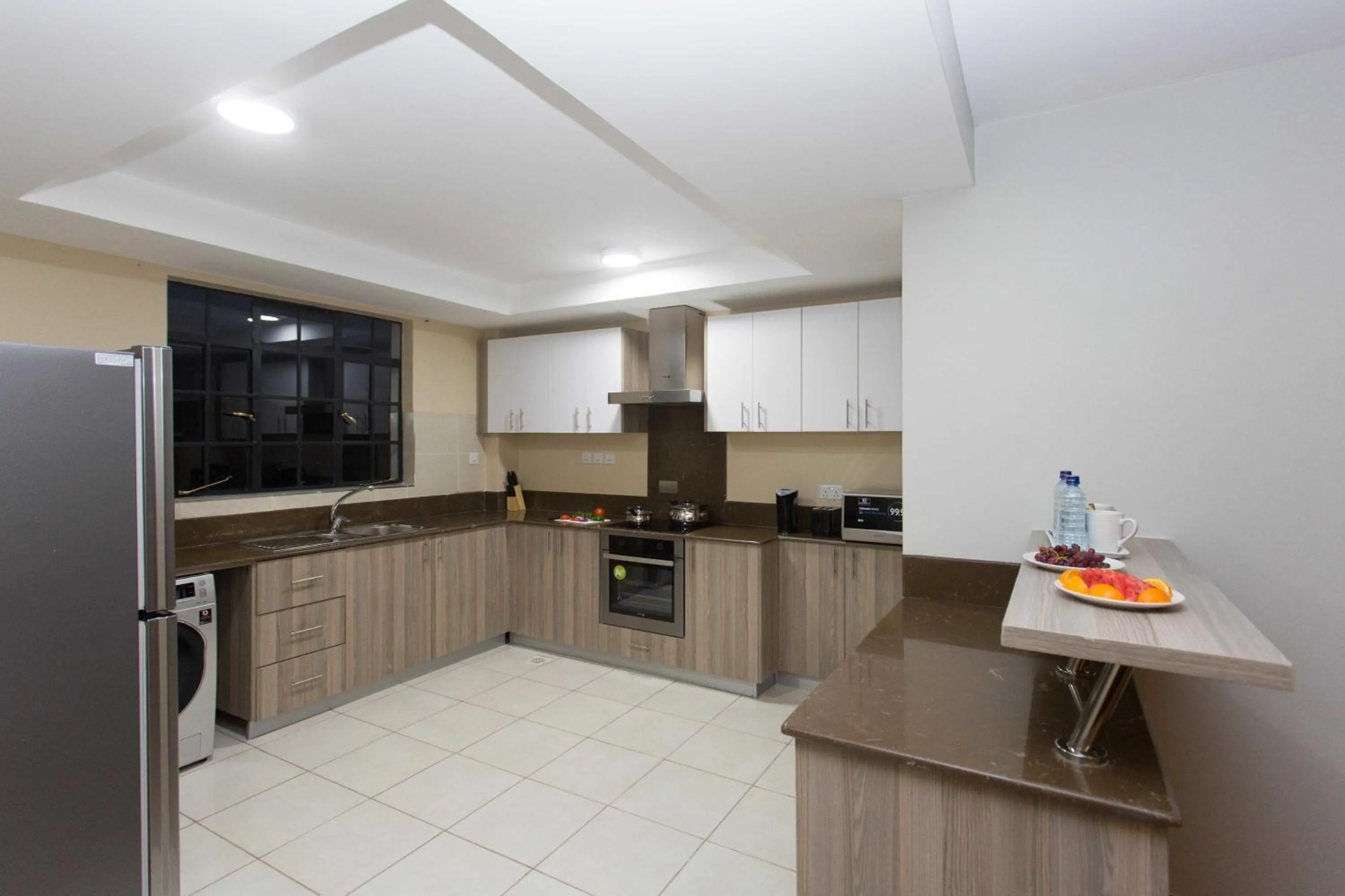 Kitchen or kitchenette in Cozy Residences by Trianum