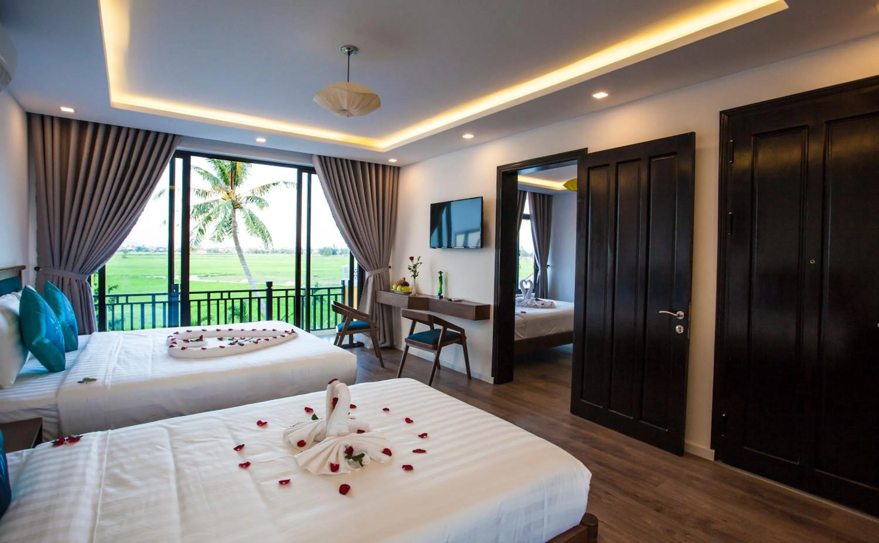 Living room, Bed in Hoi An Four Seasons Villa