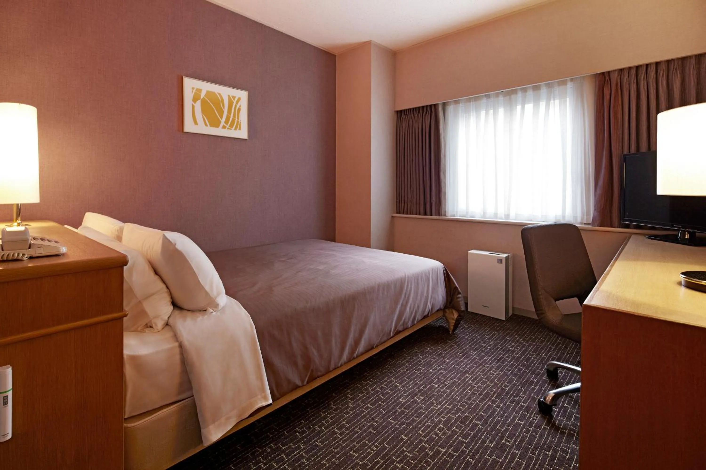 Bed in Hotel New Hankyu Osaka