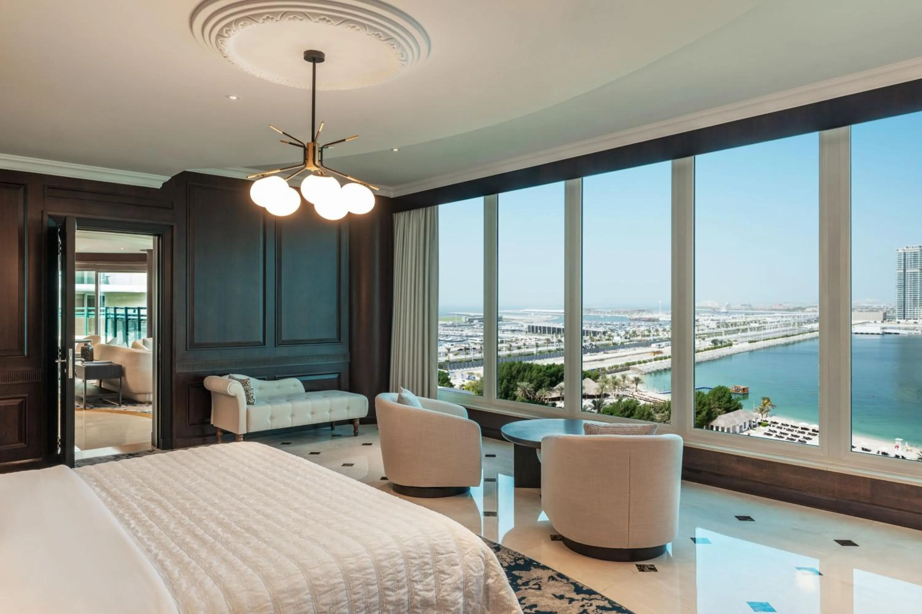 Photo of the whole room, Bed in Le Meridien Mina Seyahi Beach Resort & Waterpark