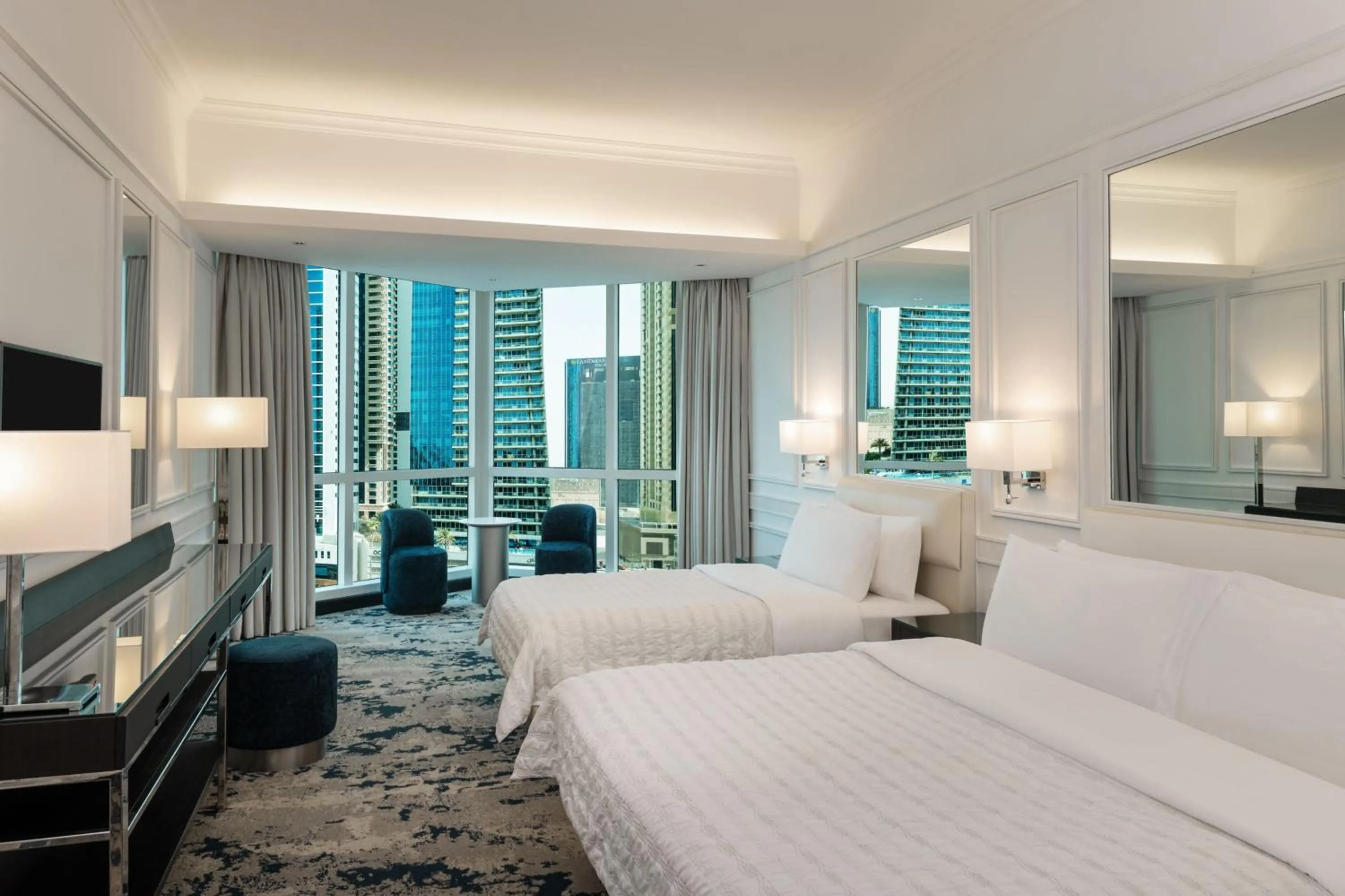 Photo of the whole room, Bed in Le Meridien Mina Seyahi Beach Resort & Waterpark