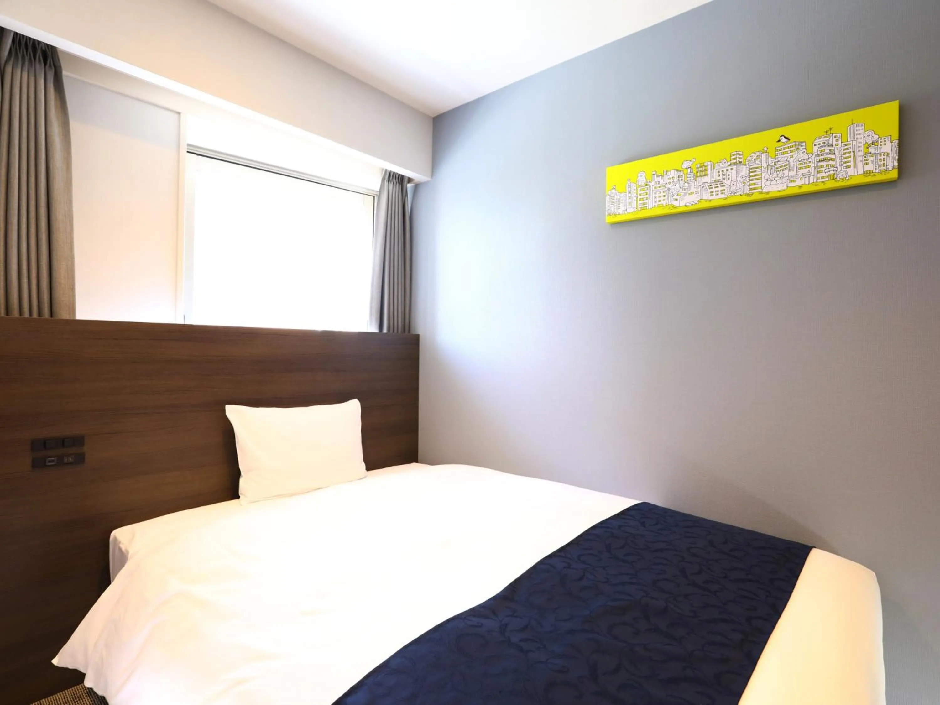 Bed in KOKO HOTEL Ikebukuro East - formerly Hotel Wing International Ikebukuro