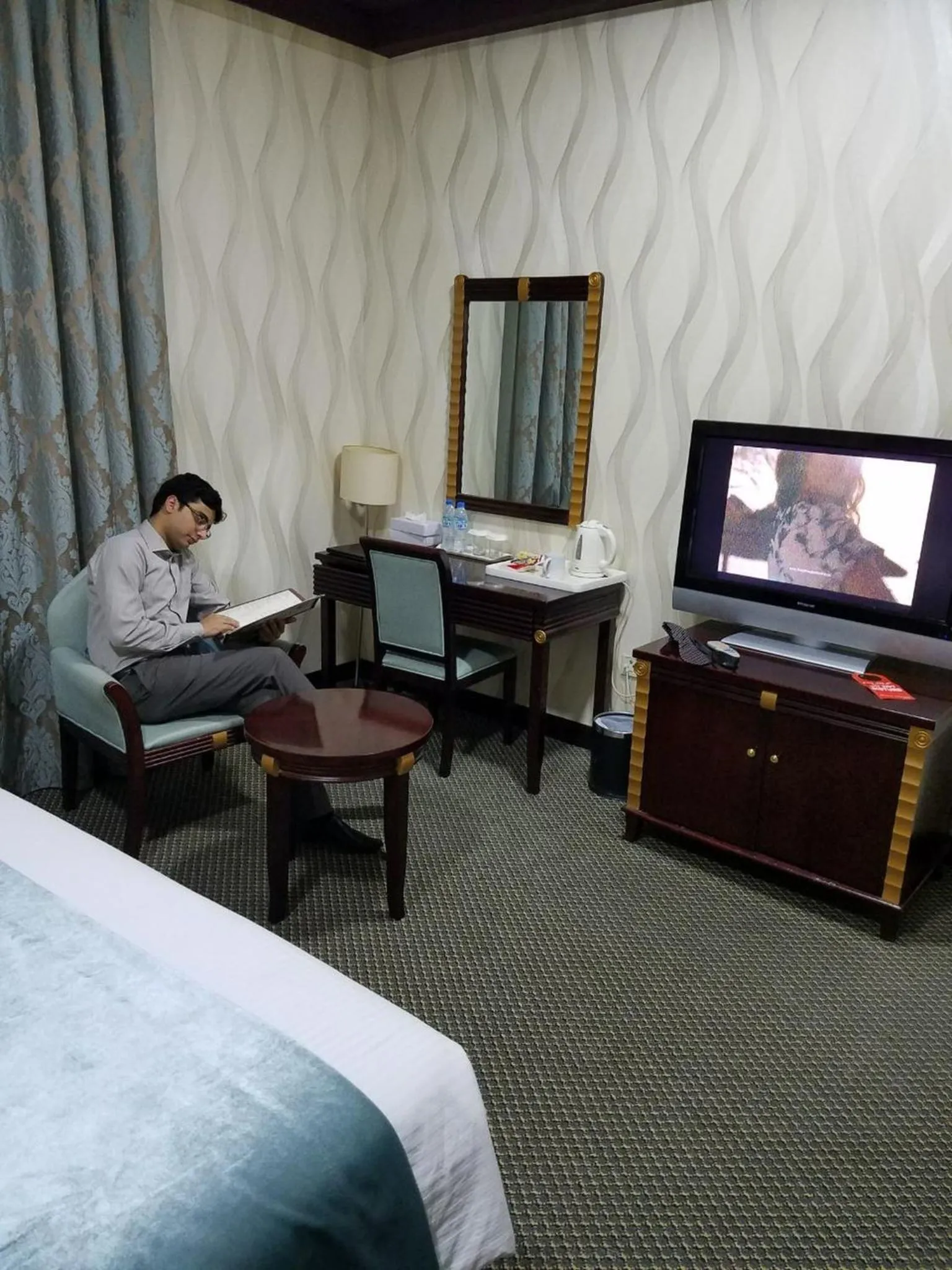 Seating area, Bed in Verona Resorts Sharjah