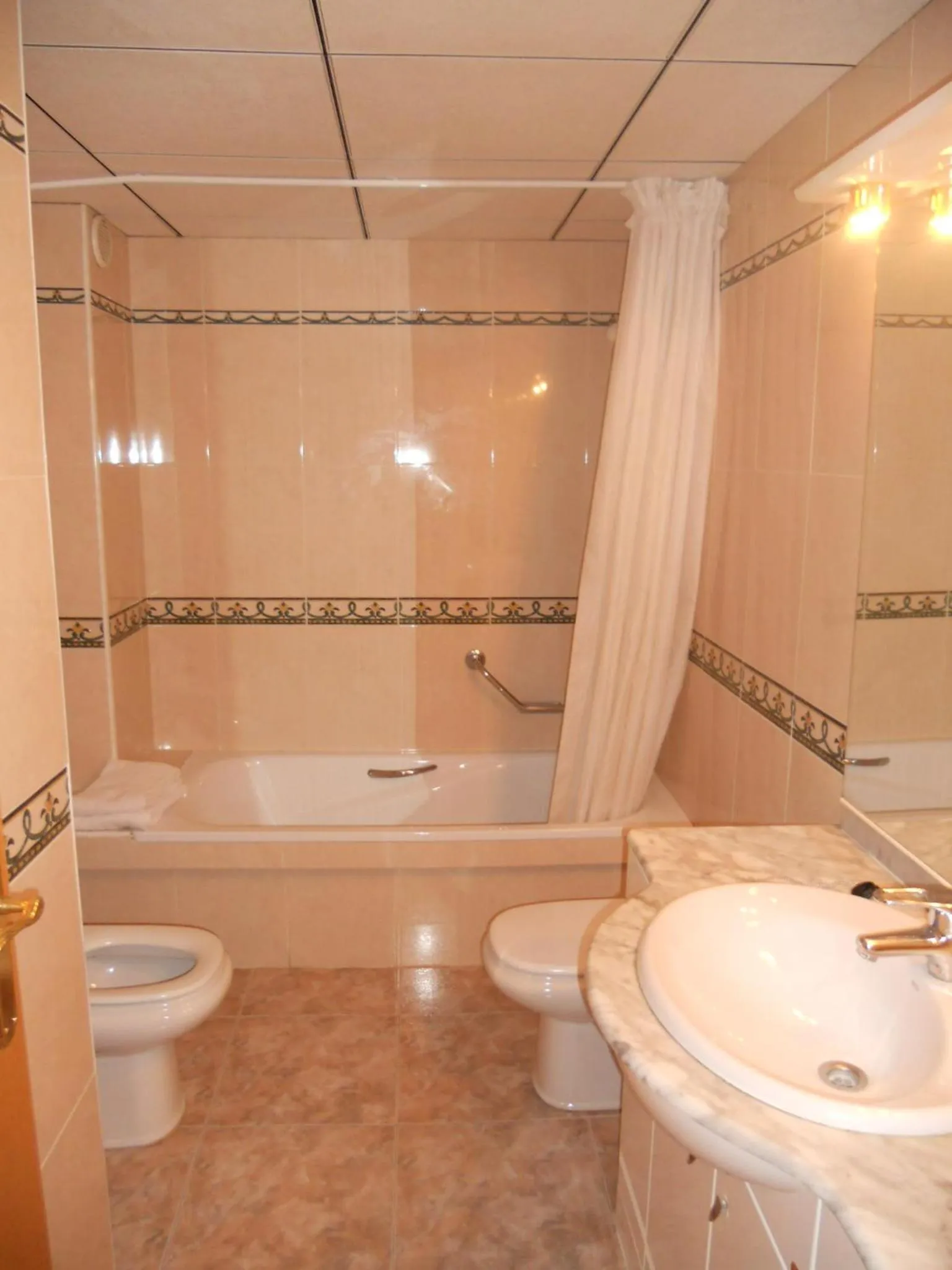 Bathroom in Apartamentos Palas Salou