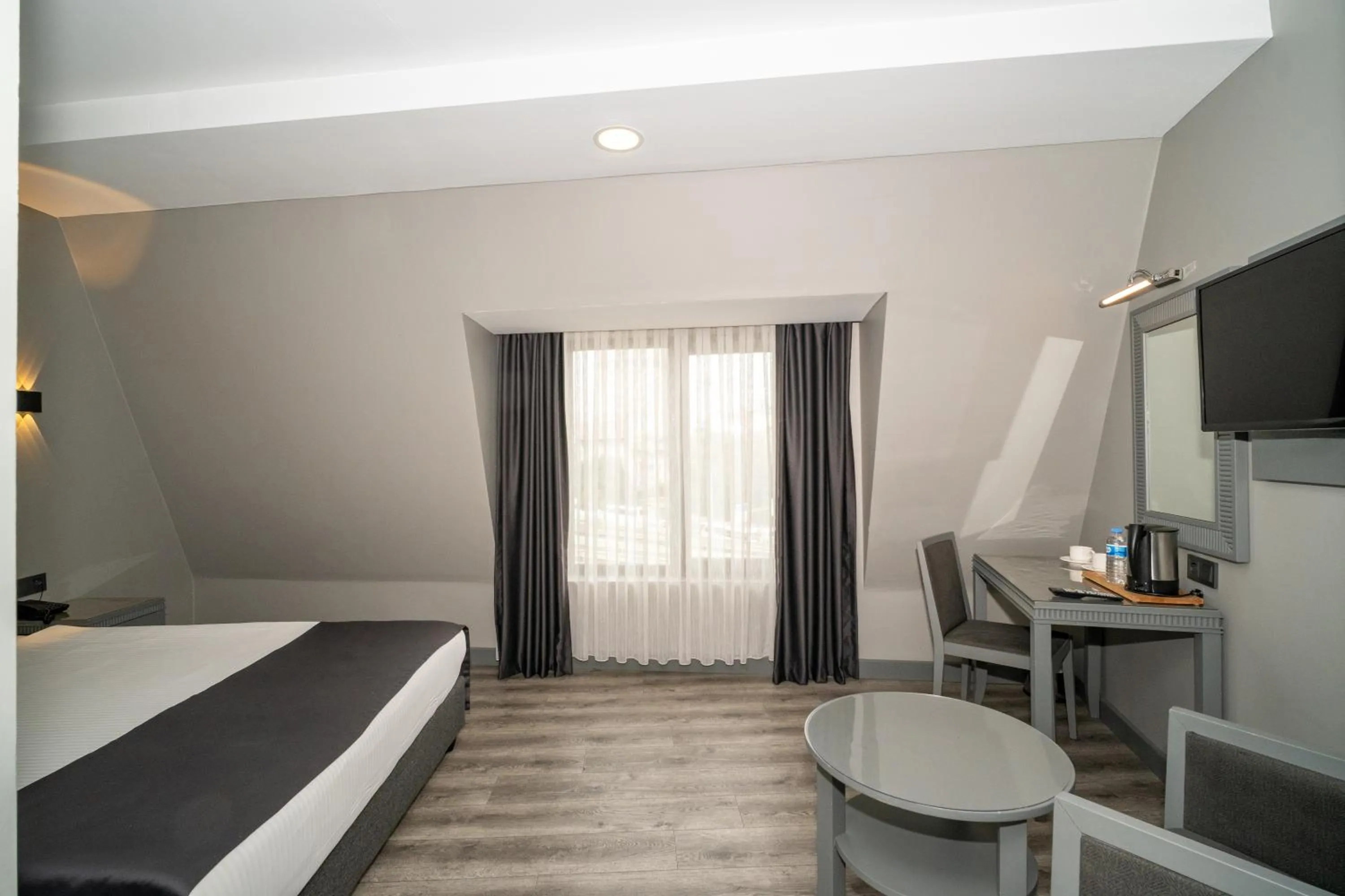 Bed in Grand S Hotel