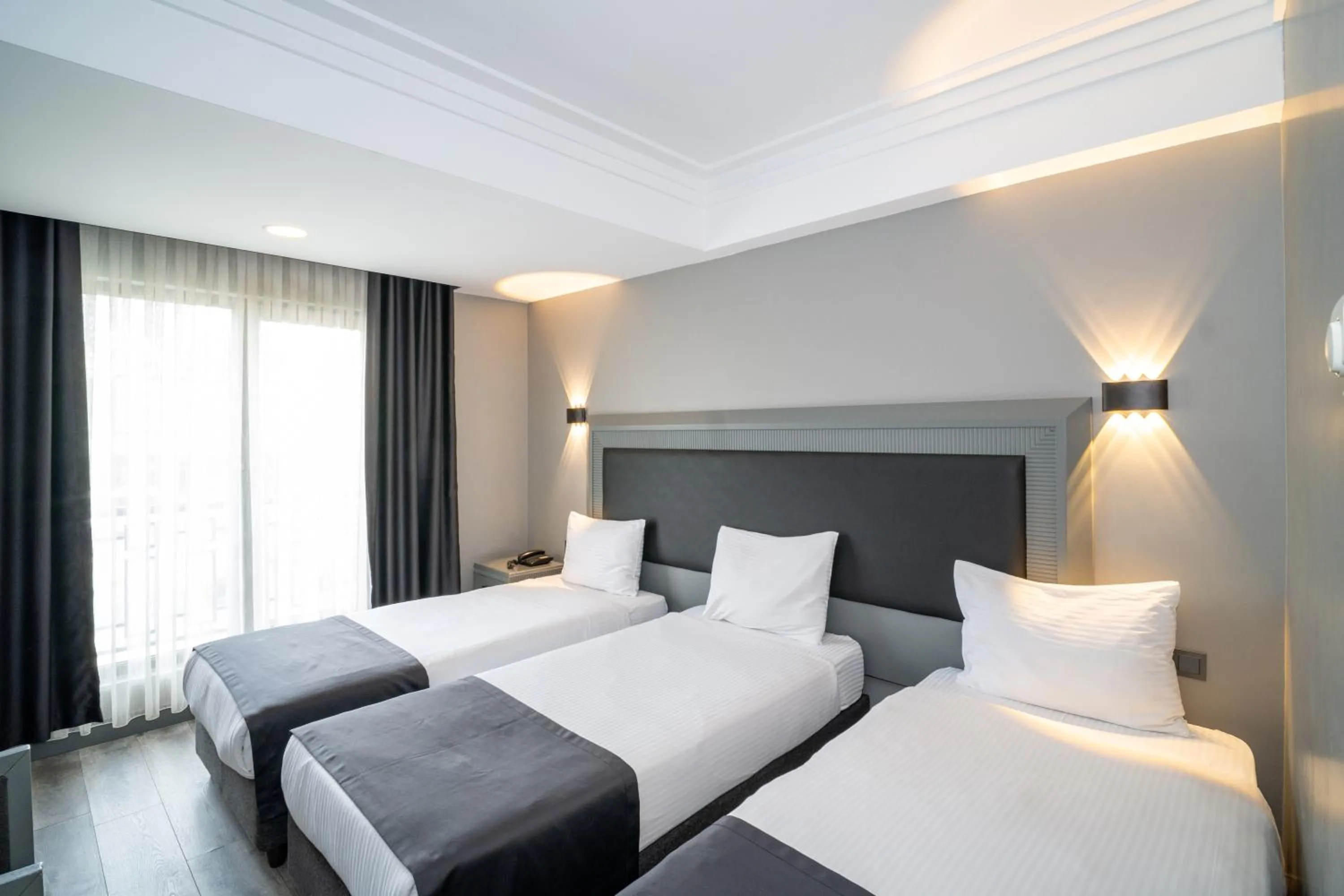 Bed in Grand S Hotel