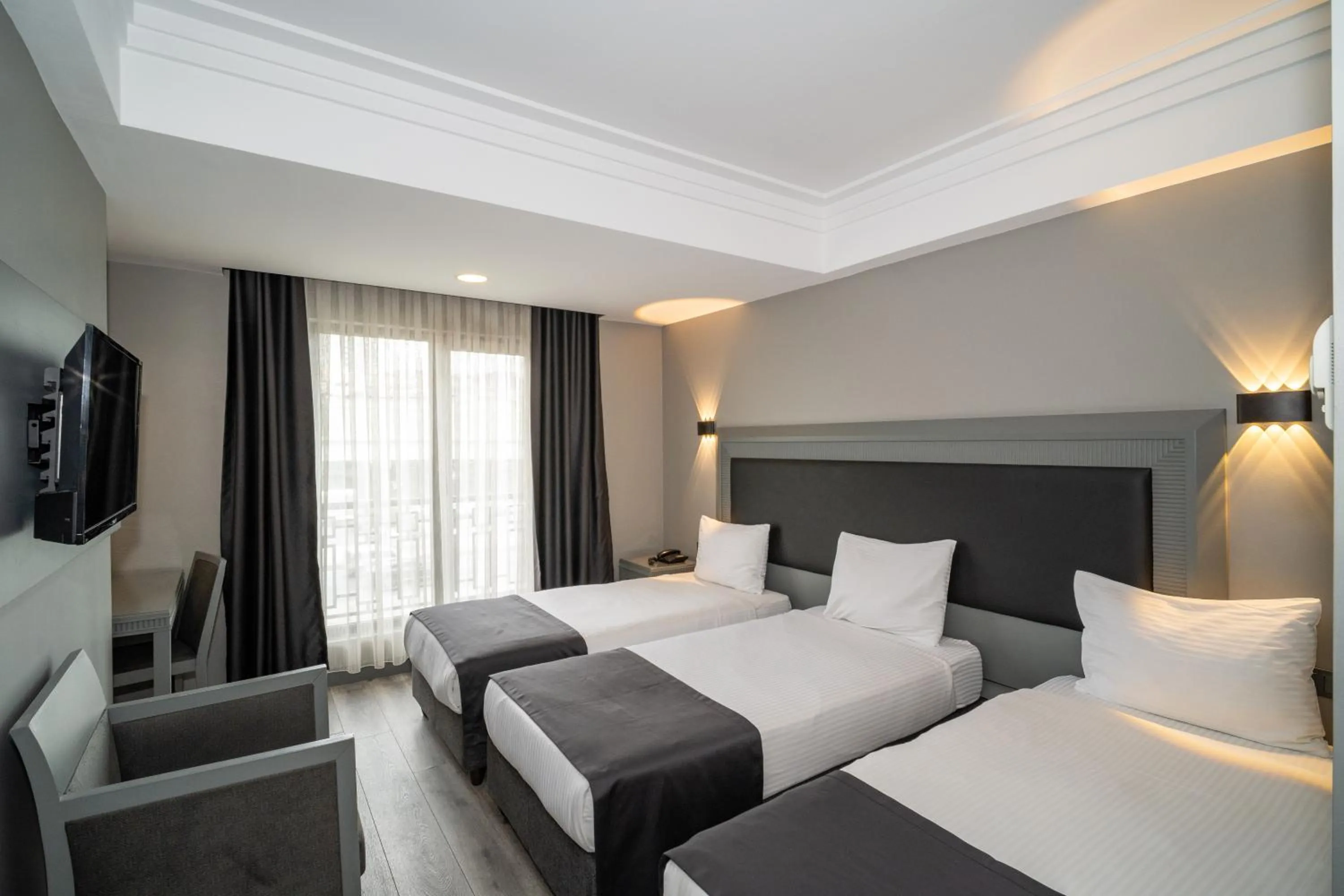 Bed in Grand S Hotel