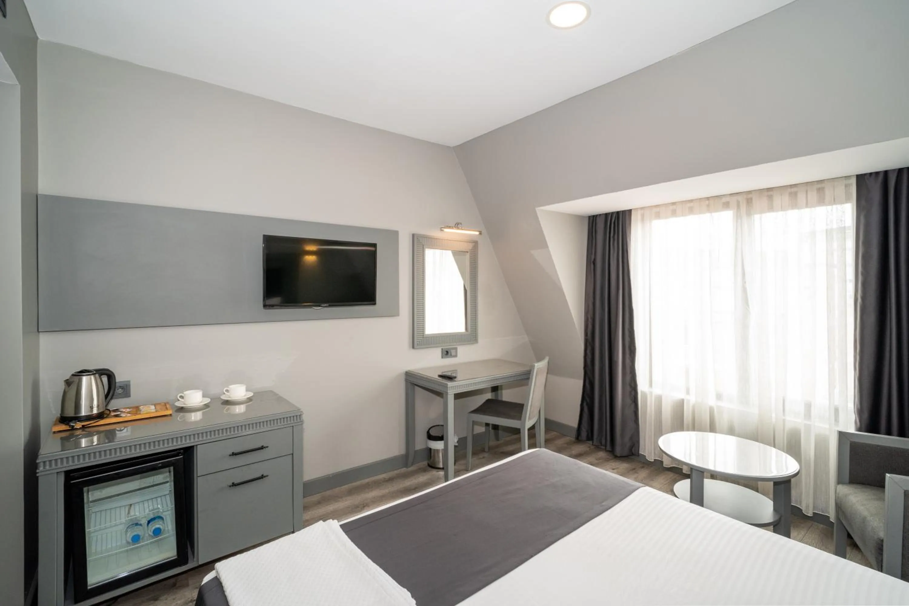 Bed in Grand S Hotel