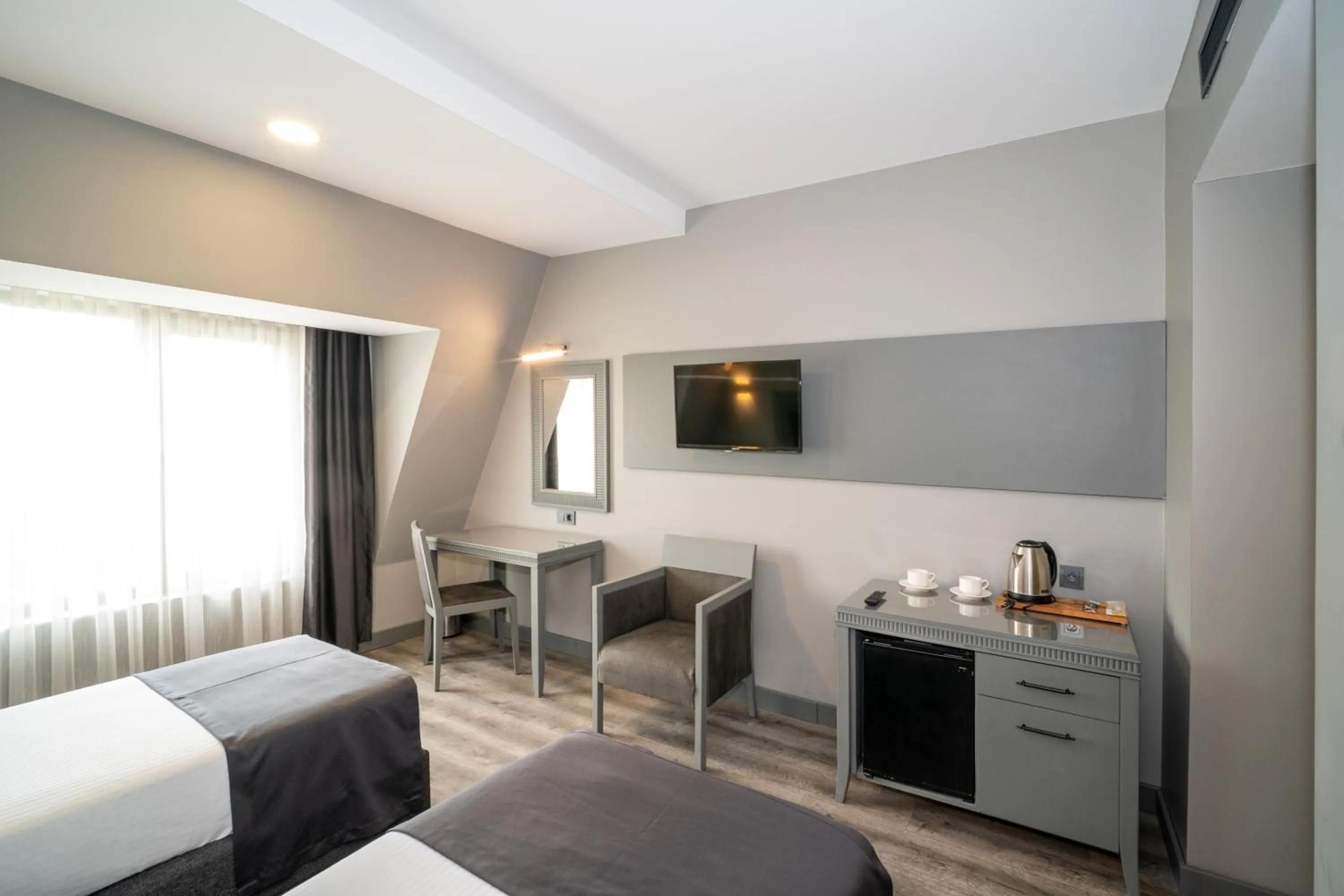 Bed in Grand S Hotel