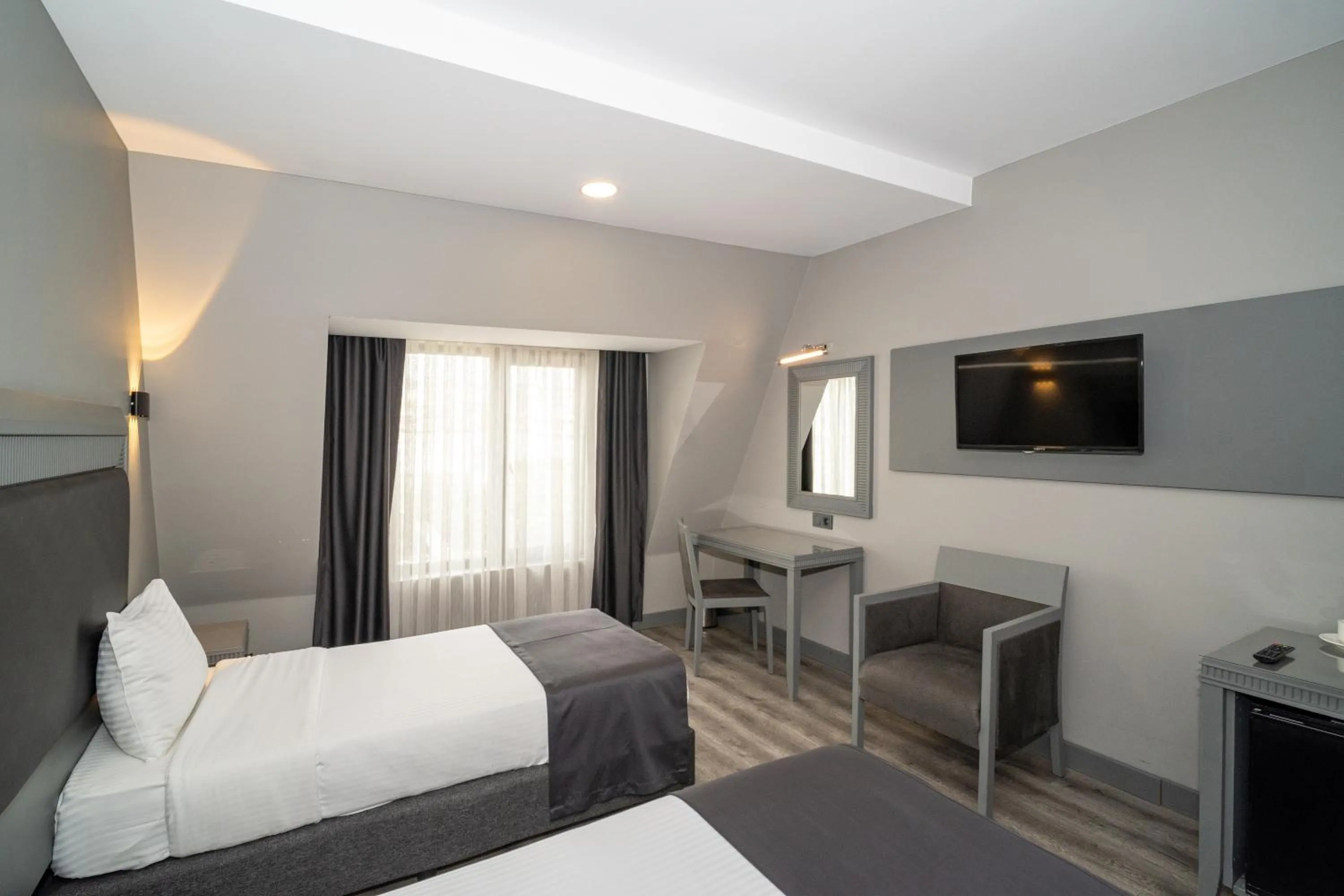 Bed in Grand S Hotel