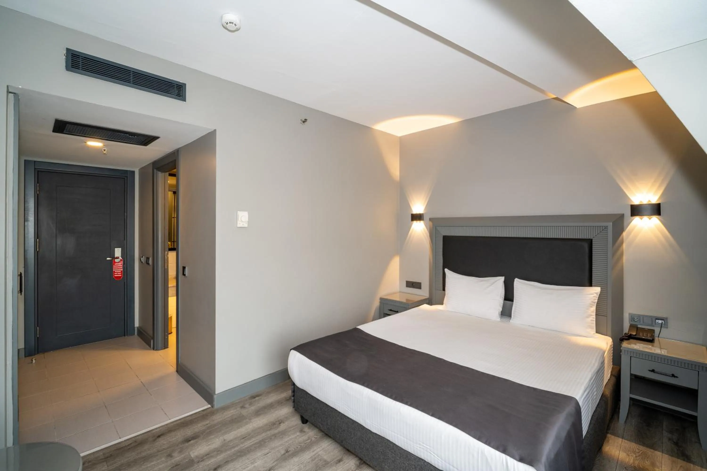 Bed in Grand S Hotel