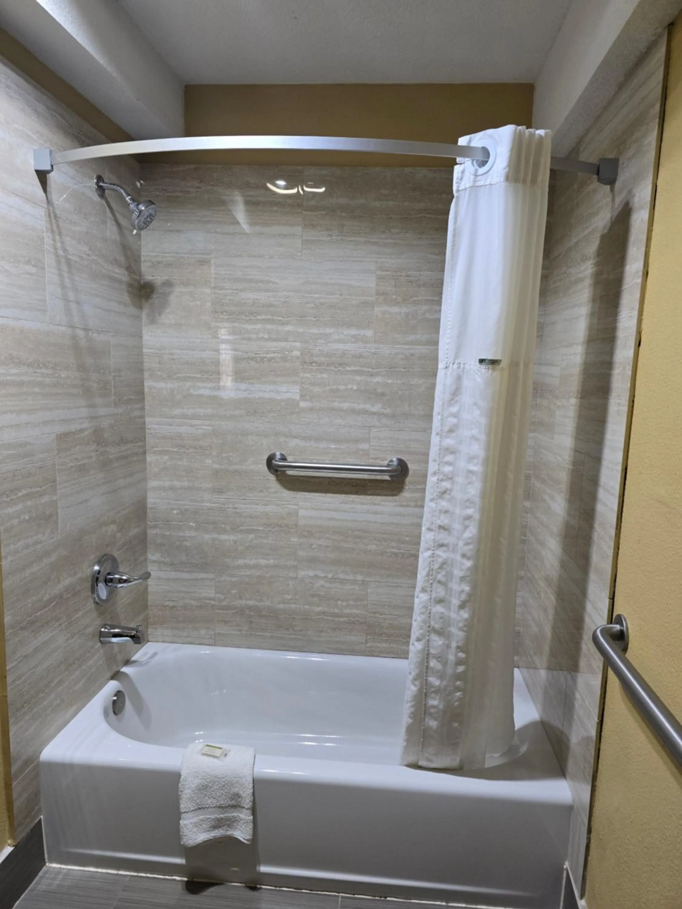 Shower in Super 8 by Wyndham Kansas City