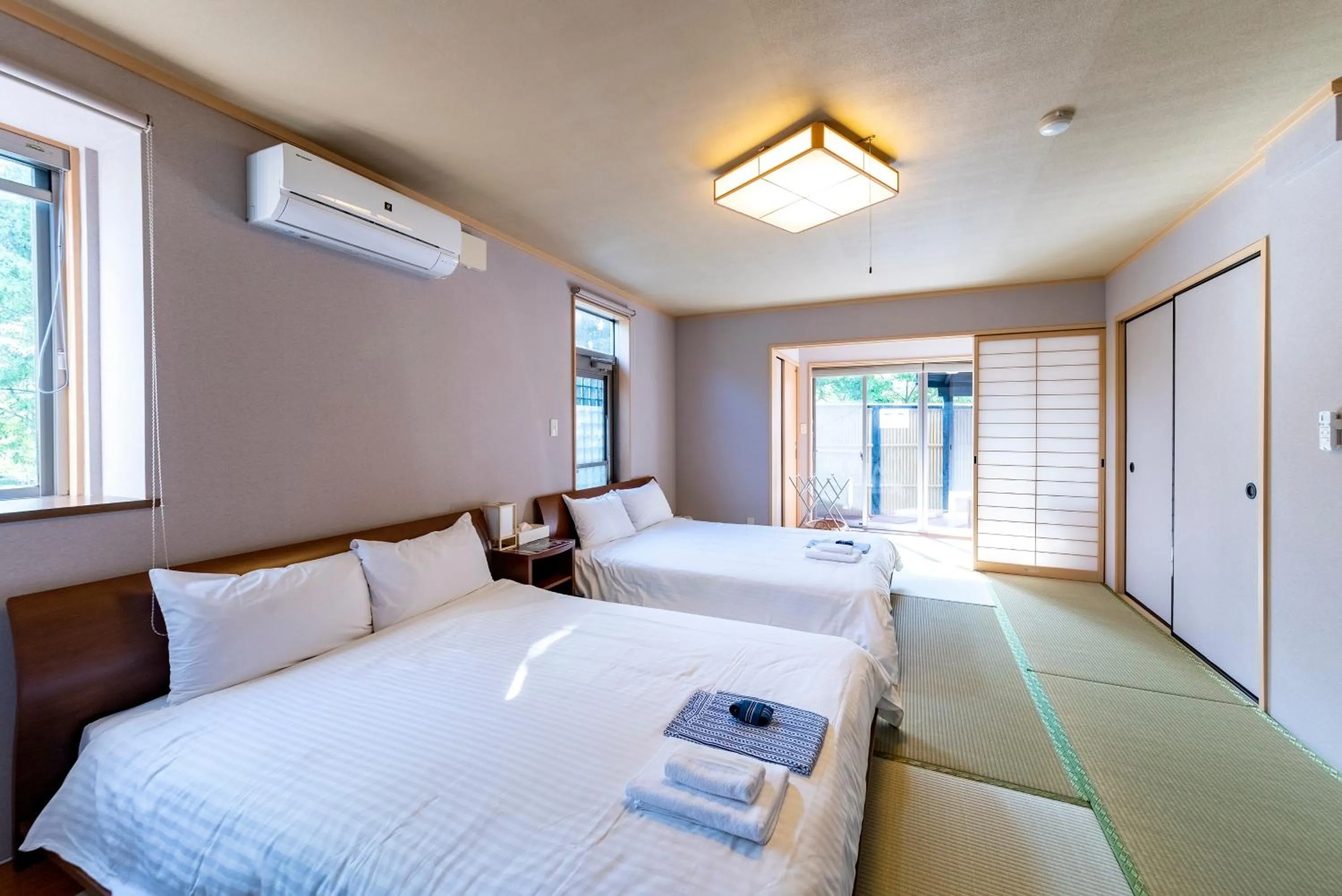 Bed in ETAVIA Yufuin Kinrinko