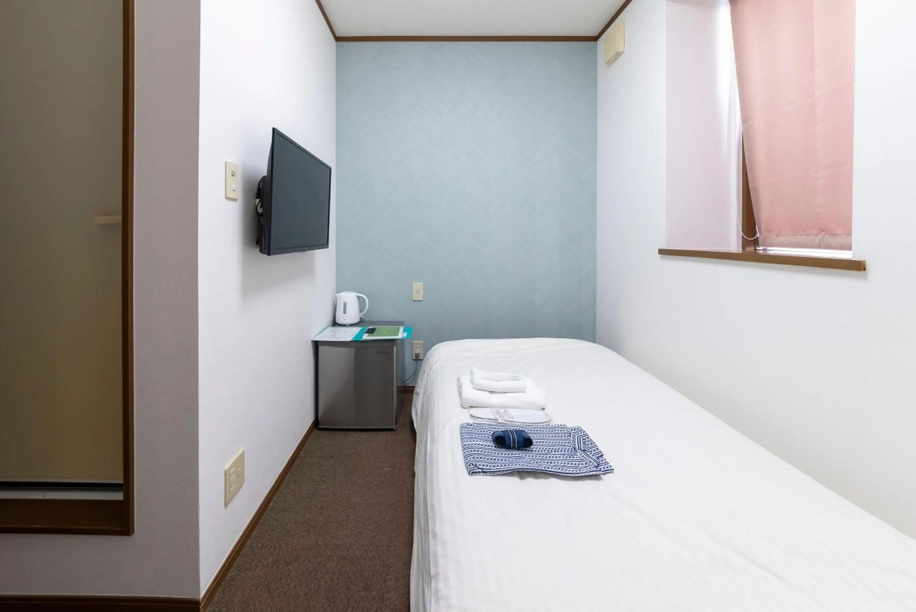 Photo of the whole room, Bed in ETAVIA Yufuin Kinrinko