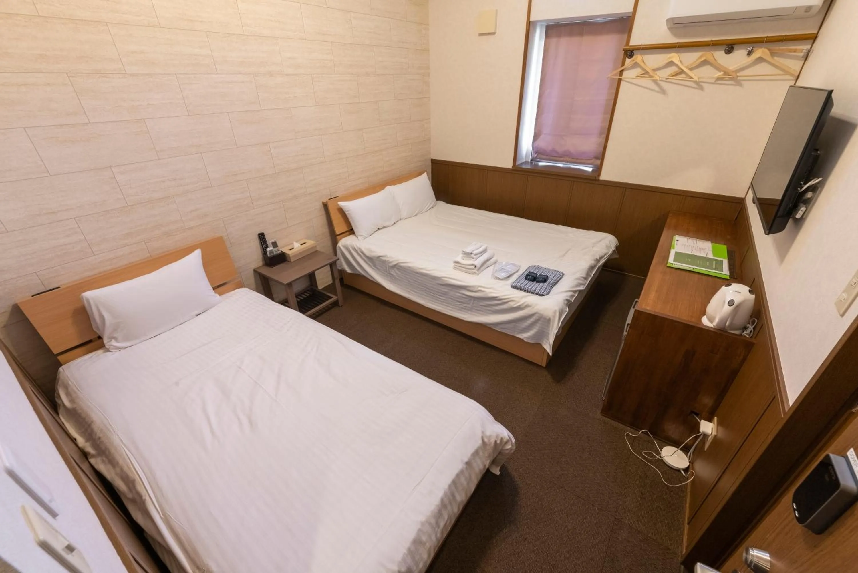 Photo of the whole room, Bed in ETAVIA Yufuin Kinrinko