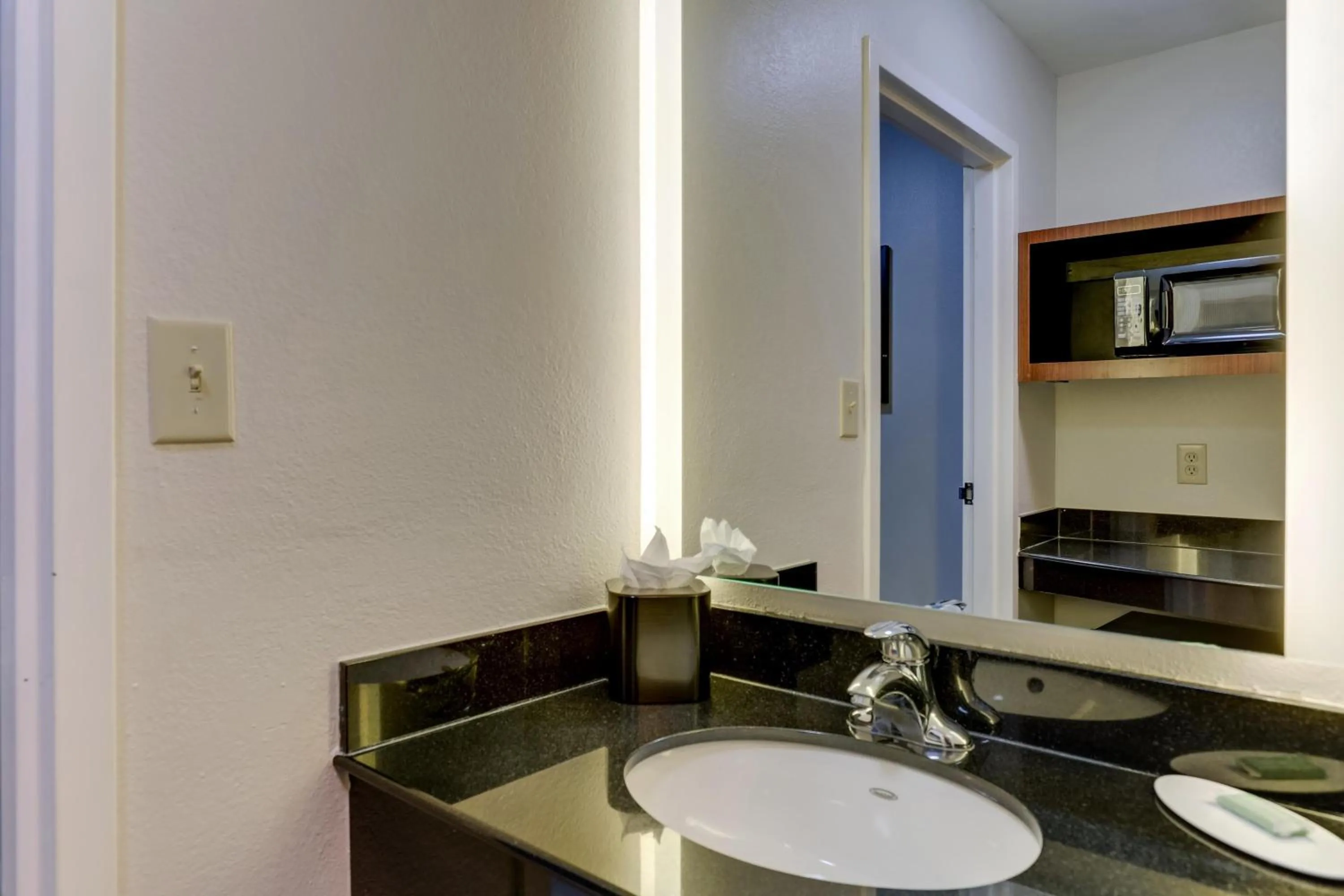 Bedroom in Las Colinas Inn Irving, SureStay Collection by Best Western