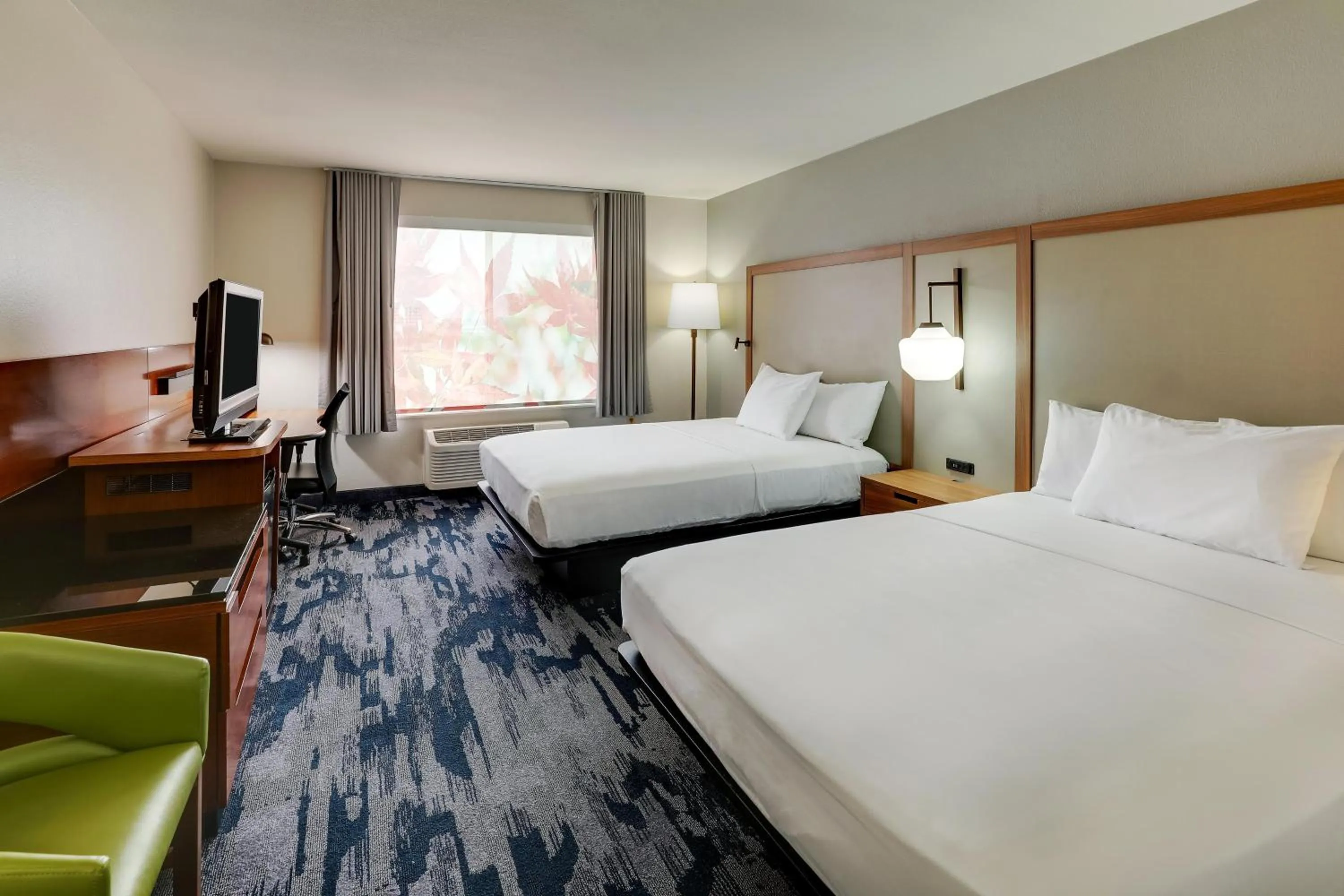 Bedroom, Bed in Las Colinas Inn Irving, SureStay Collection by Best Western