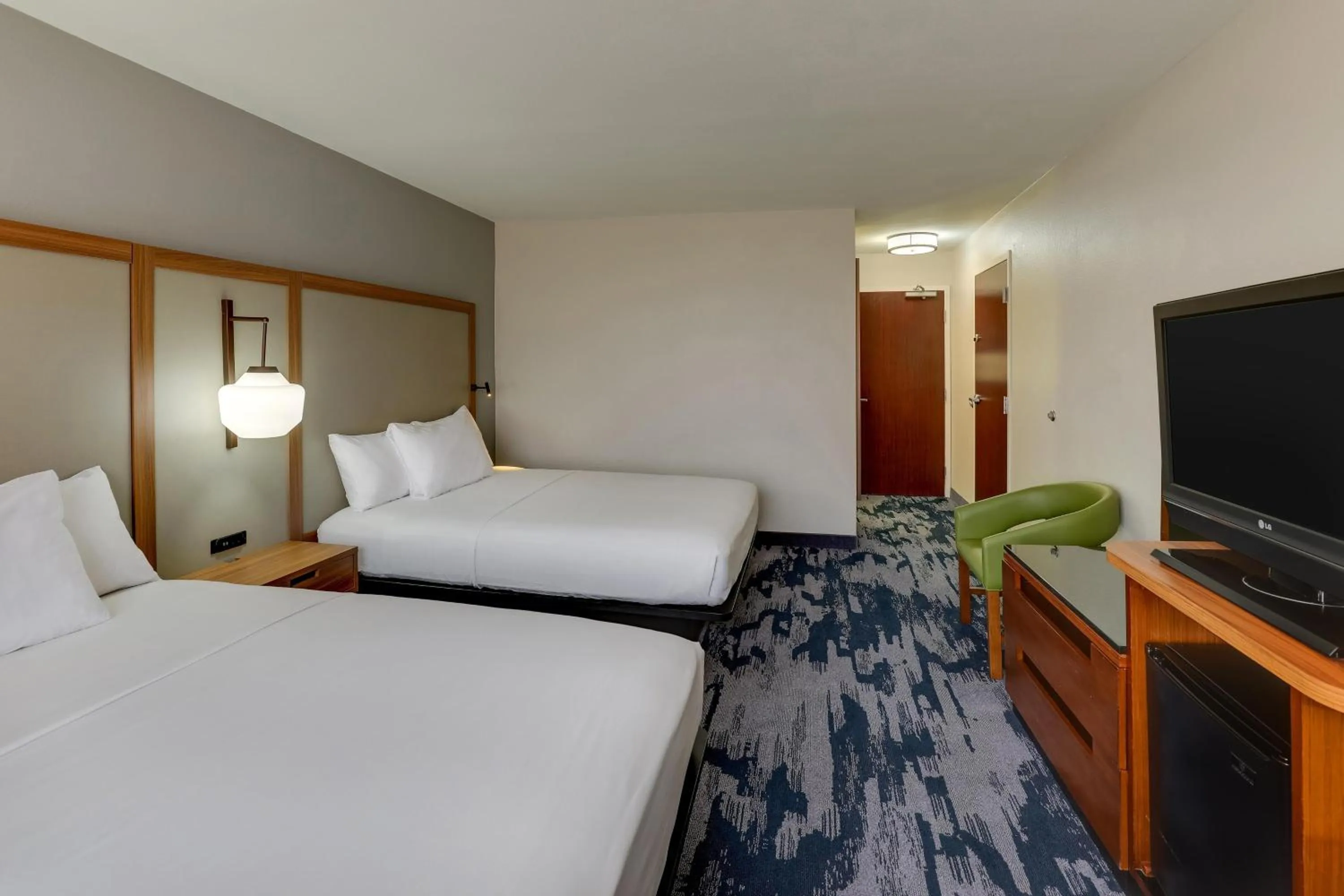 Bedroom, Bed in Las Colinas Inn Irving, SureStay Collection by Best Western