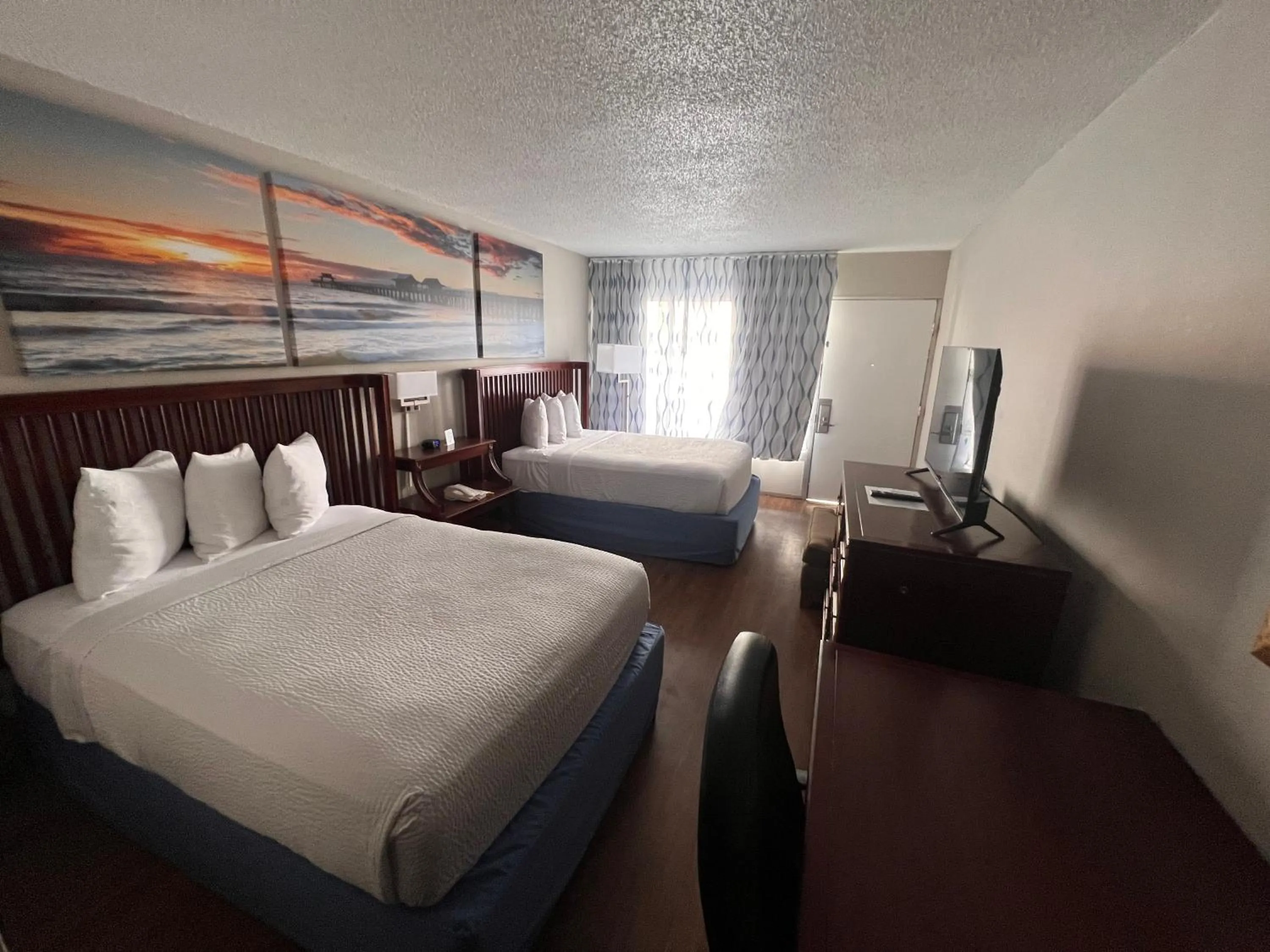 Bedroom, Bed in Days Inn by Wyndham Daytona Beach Speedway