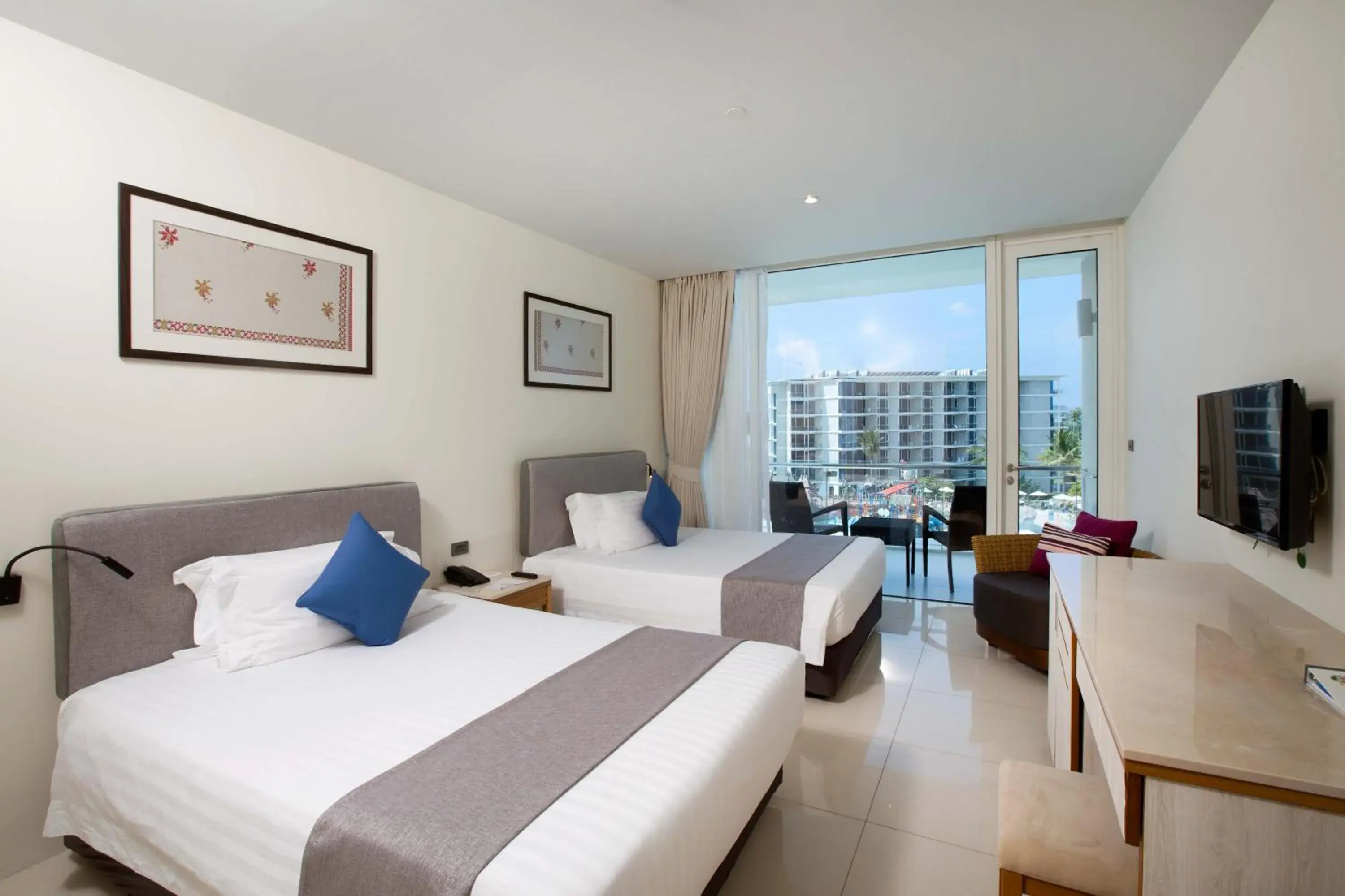 DD1B: Deluxe Double Double with balcony in Splash Beach Resort Phuket Family-Friendly Water Park Resort Near Phuket Airport DD1B: Deluxe Double Double with balcony in Splash Beach Resort Phuket Family-Friendly Water Park Resort Near Phuket Airport