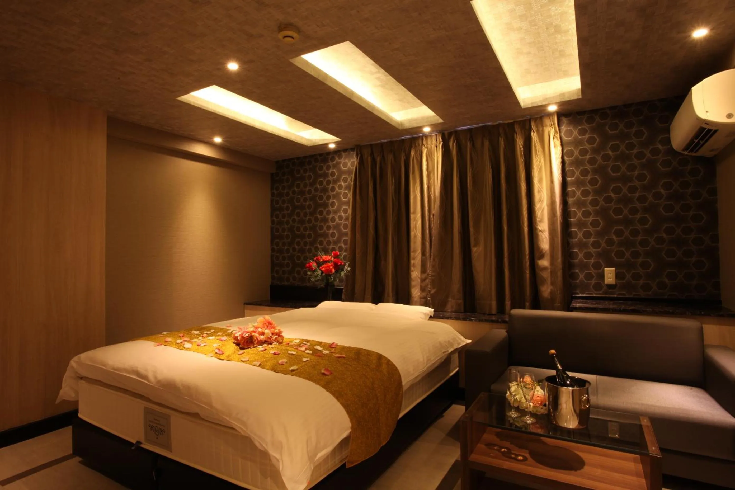 Bed in ホテルオリジン Hotel Origin 男塾ホテルグループ