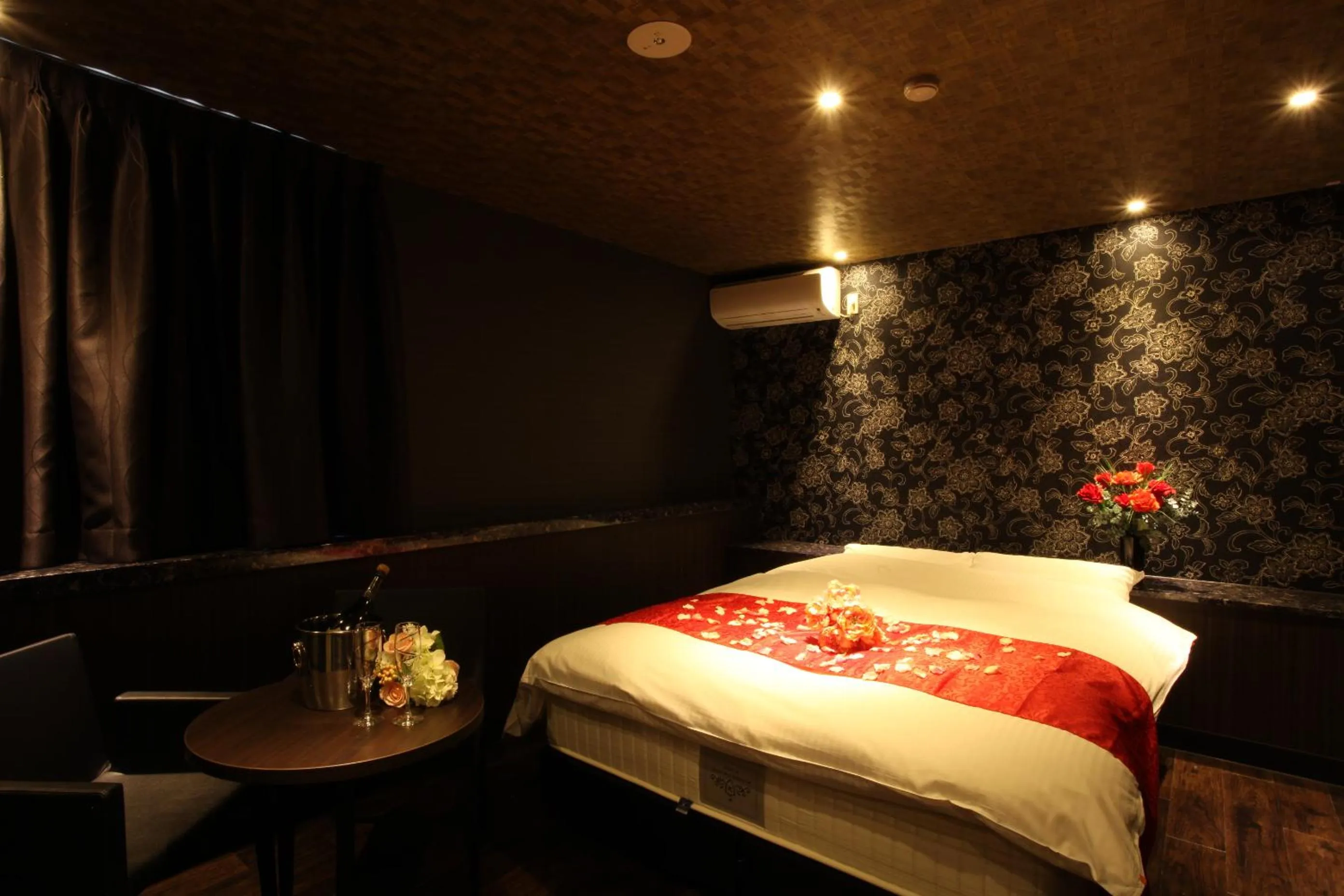 Bed in ホテルオリジン Hotel Origin 男塾ホテルグループ