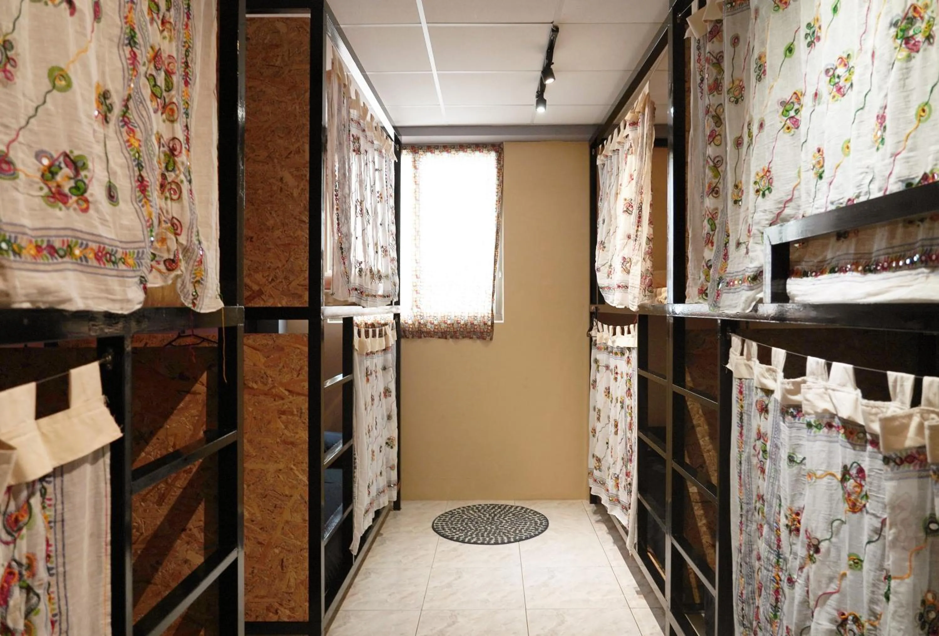 Bed in Dulan The Travel Bug Bistro Inn