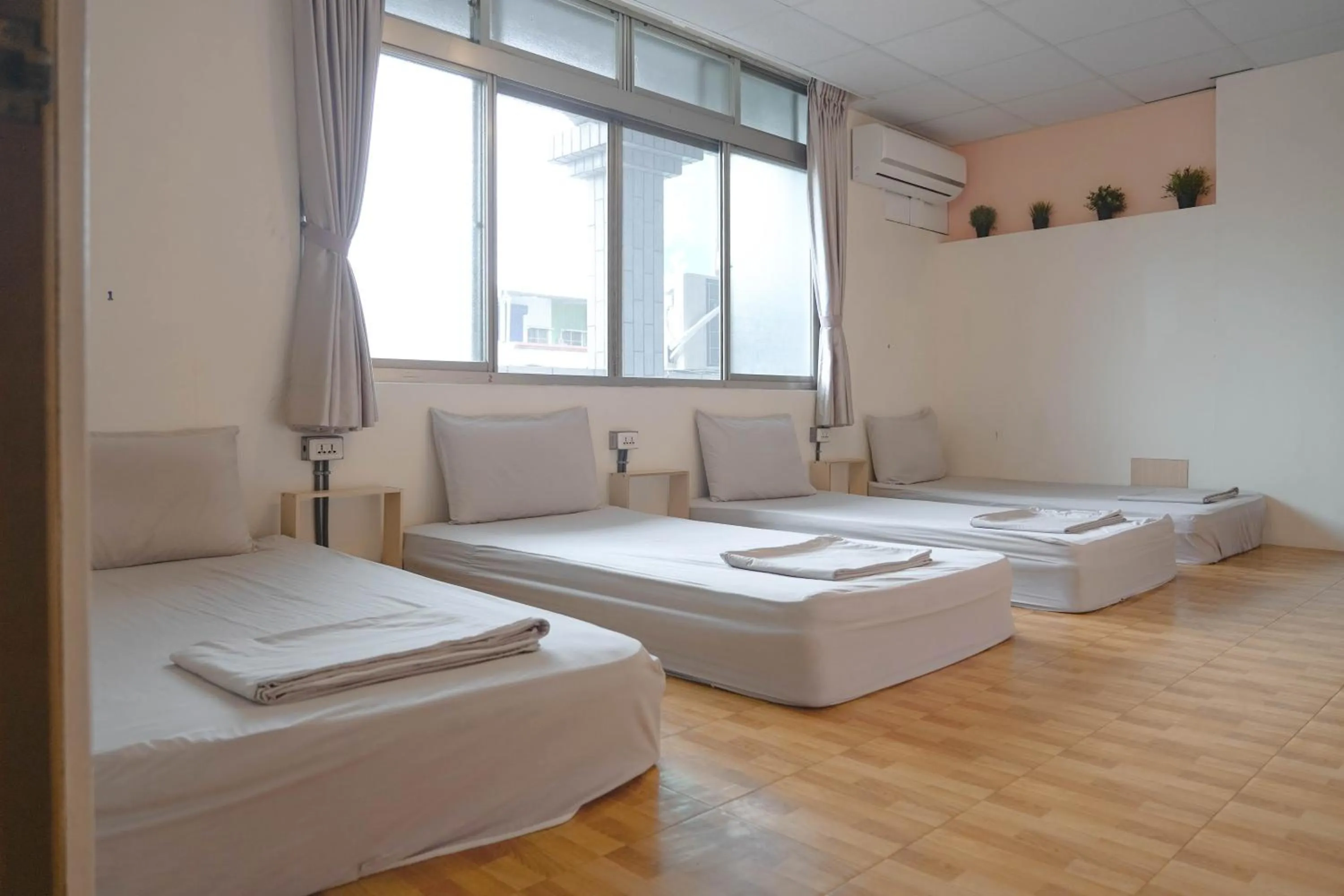 Bed in Dulan The Travel Bug Bistro Inn