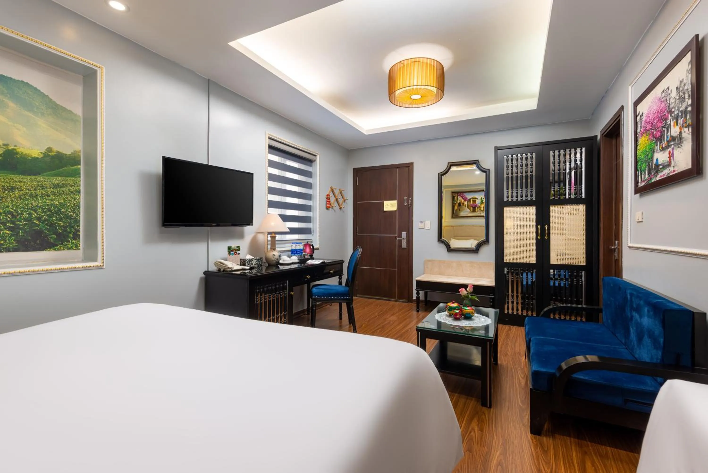 Seating area, Bed in Golden Legend Boutique Hotel