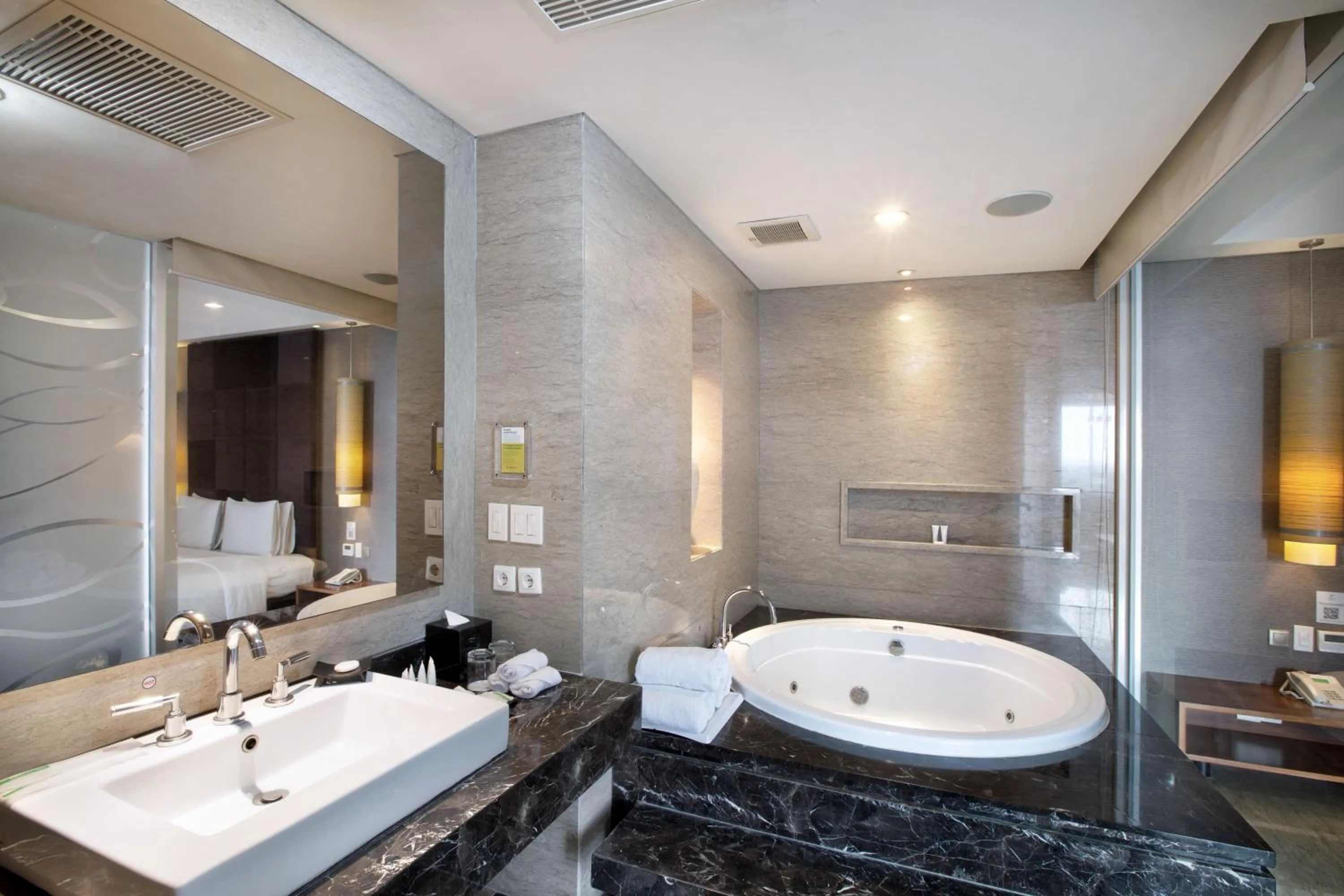 Bathroom in Holiday Inn Bandung Pasteur by IHG