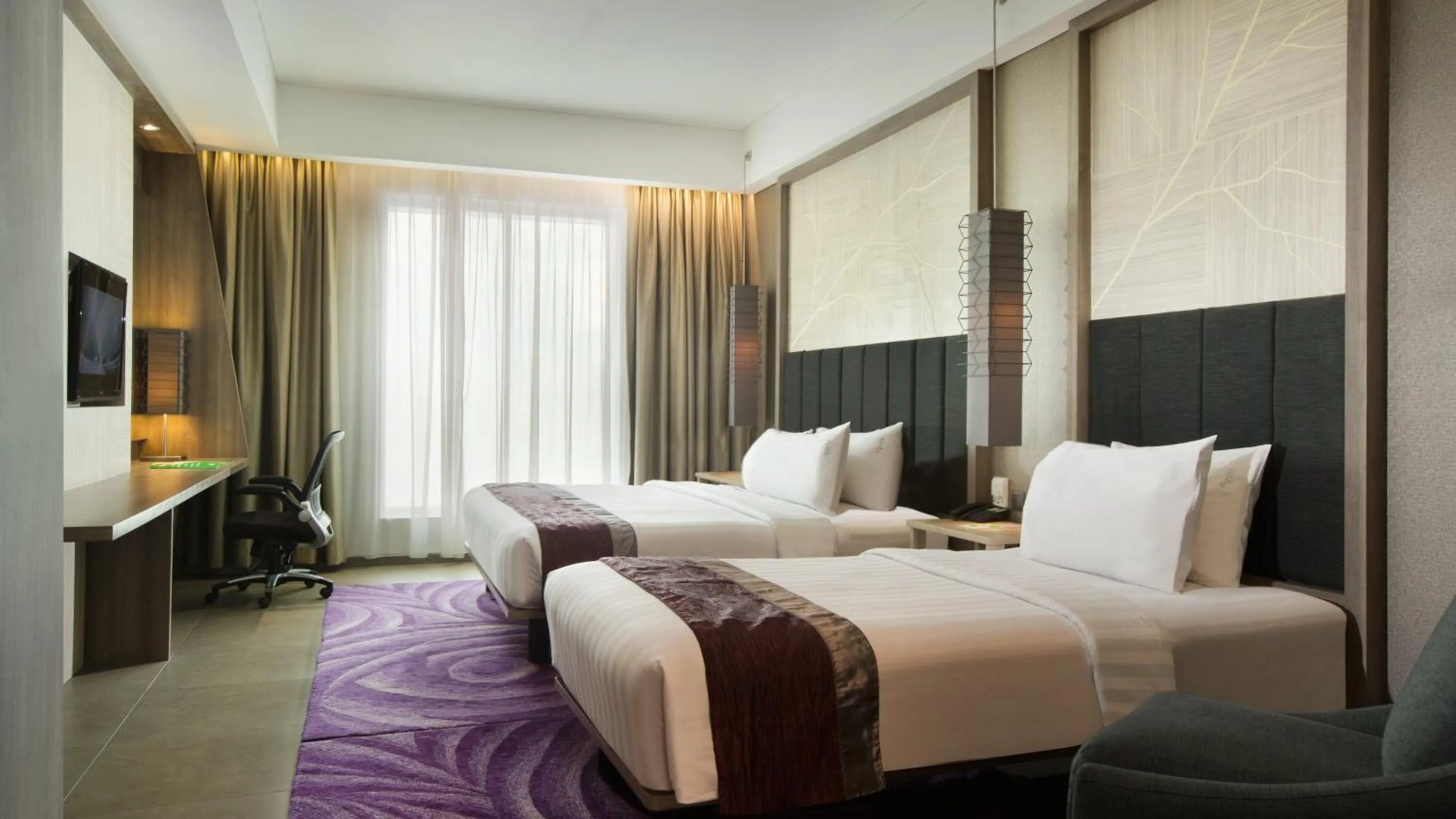 Photo of the whole room, Bed in Holiday Inn Bandung Pasteur by IHG