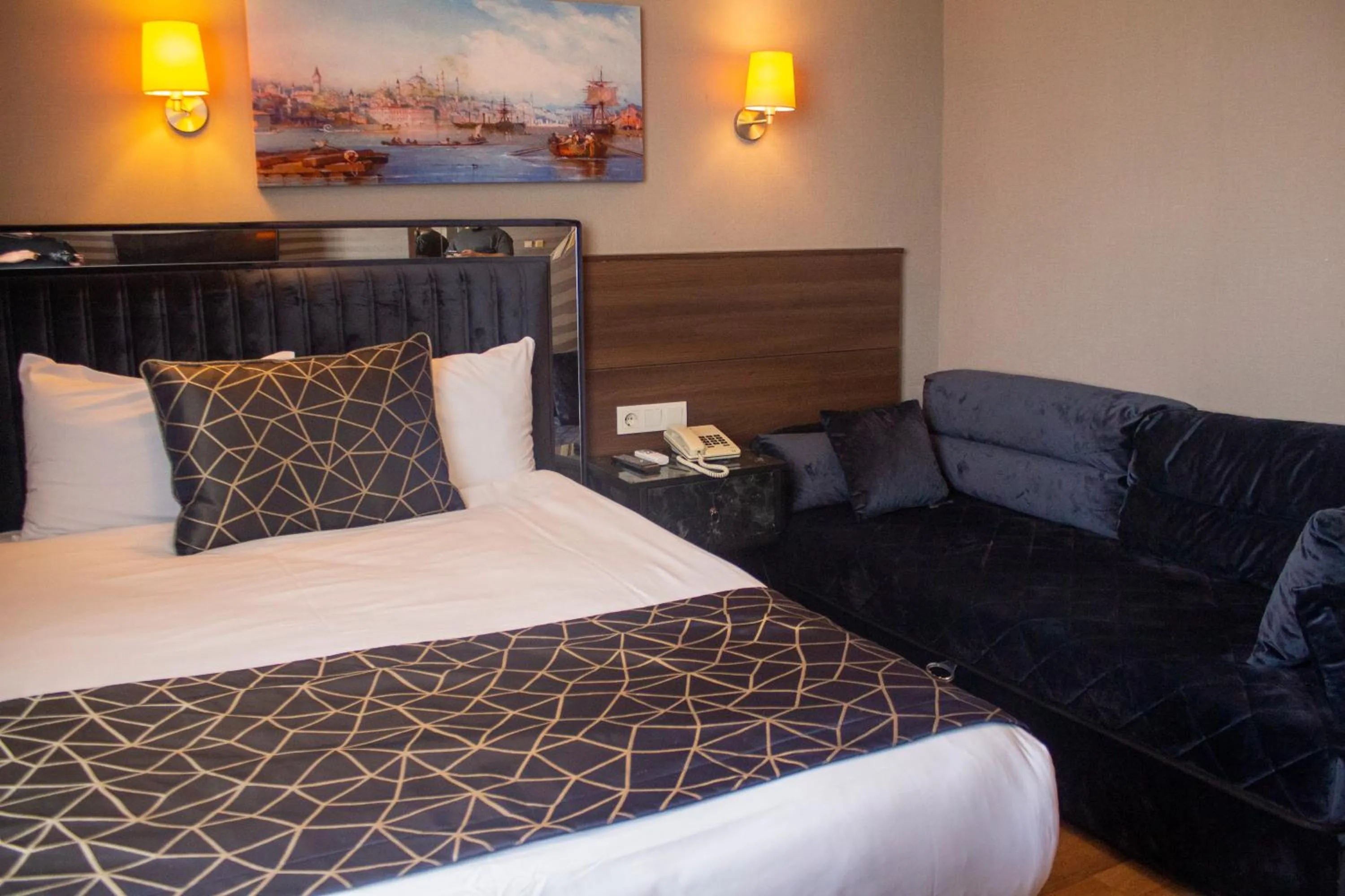 Bed in Star City Hotel