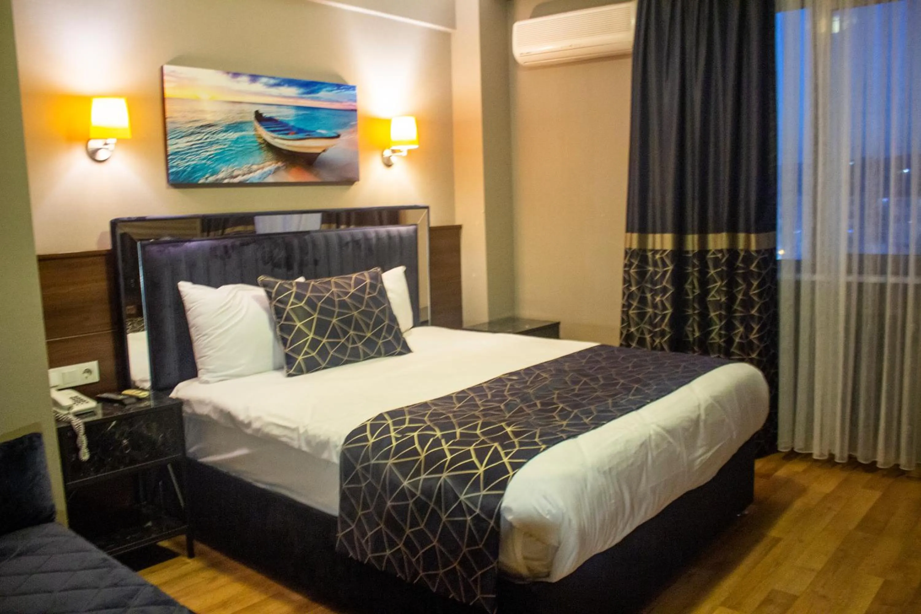 Bed in Star City Hotel