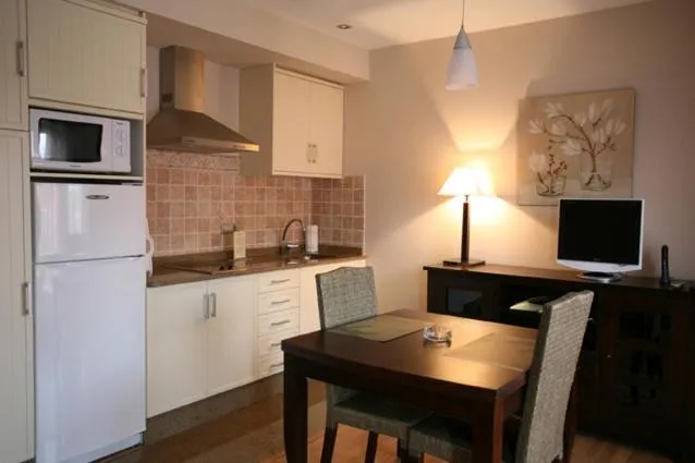 Kitchen or kitchenette in Hotel Restaurante El Tollo