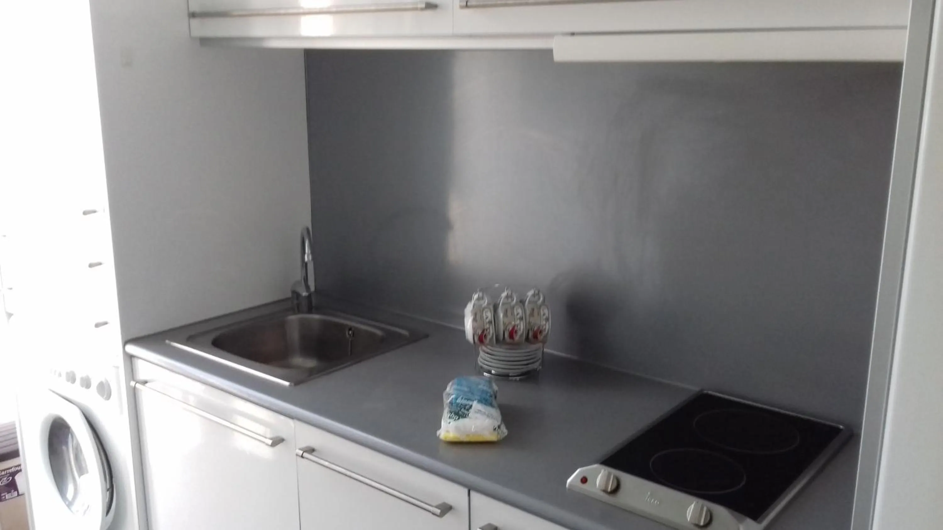 Kitchen or kitchenette in Apartamentos Turísticos Los Ángeles