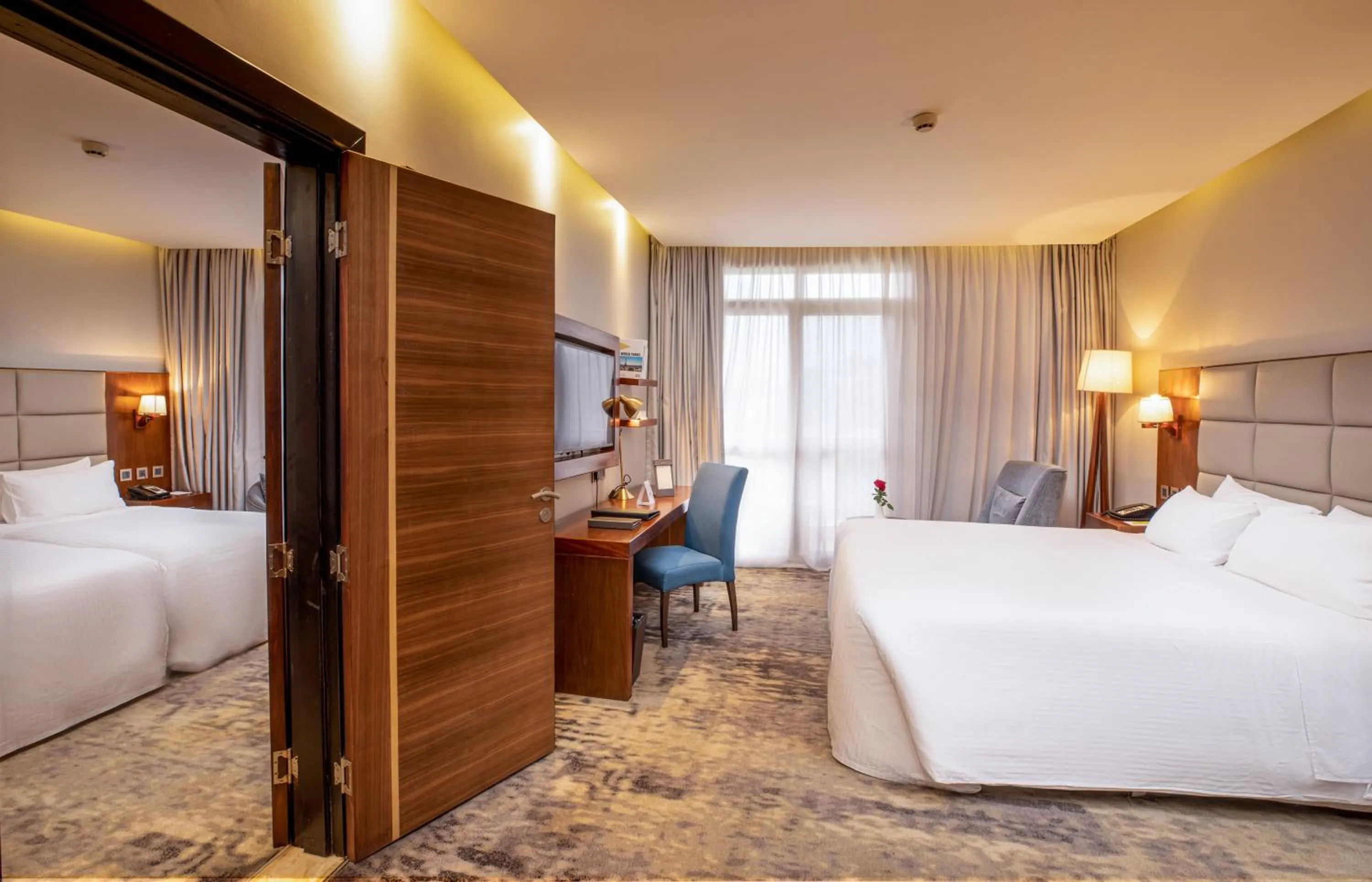 Bed in Golden Tulip Canaan Kampala