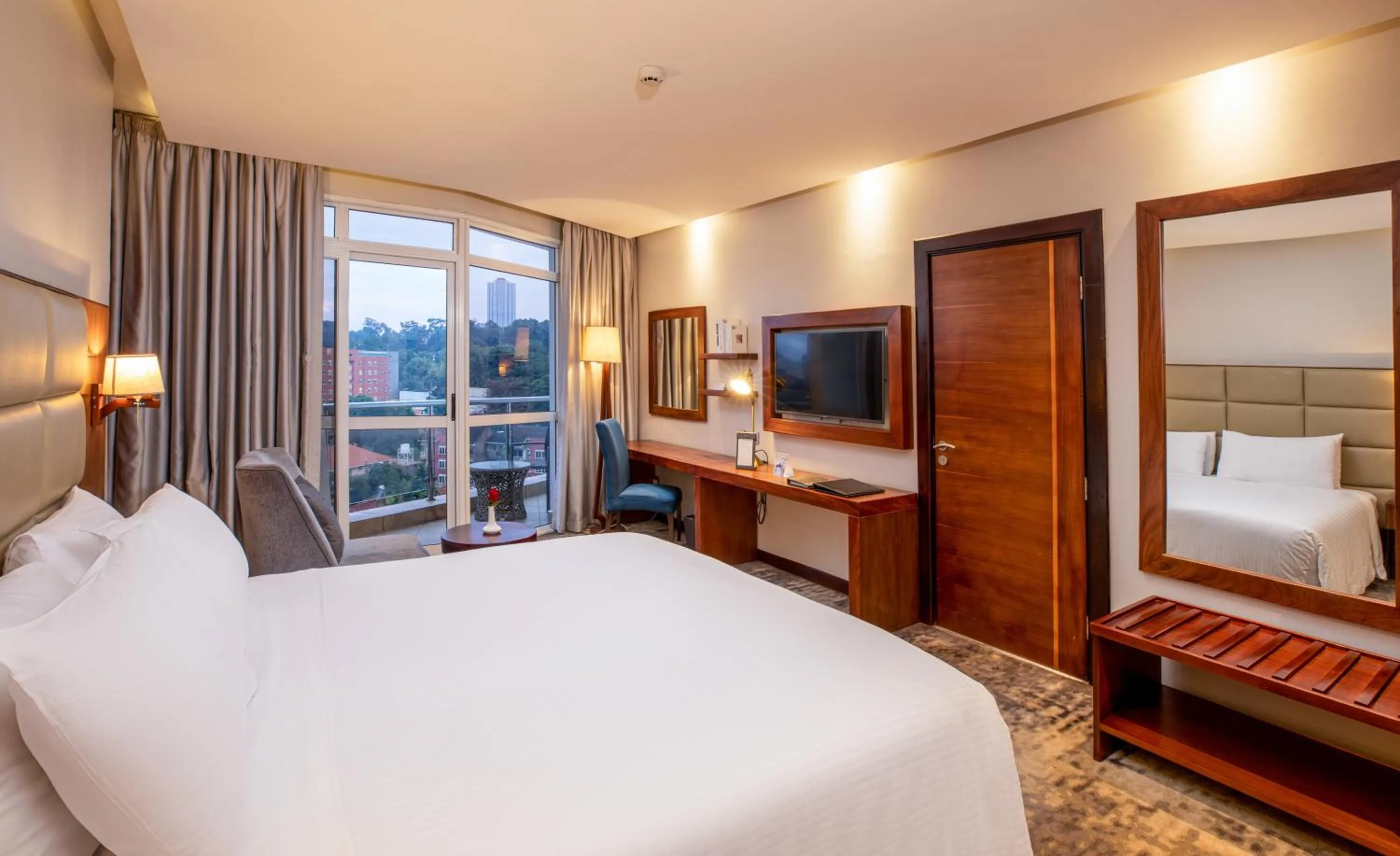 Bed in Golden Tulip Canaan Kampala