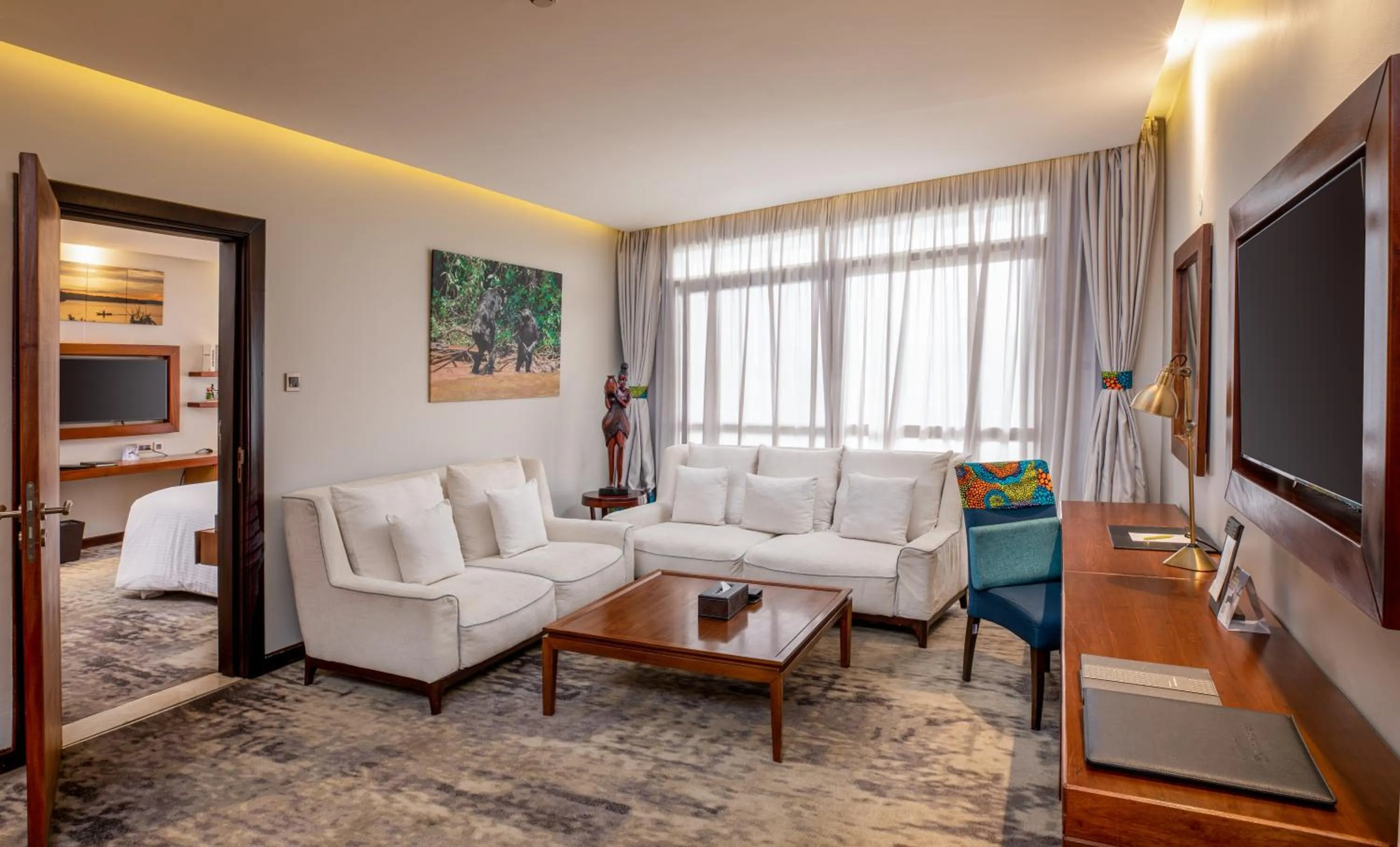 Communal lounge/ TV room in Golden Tulip Canaan Kampala