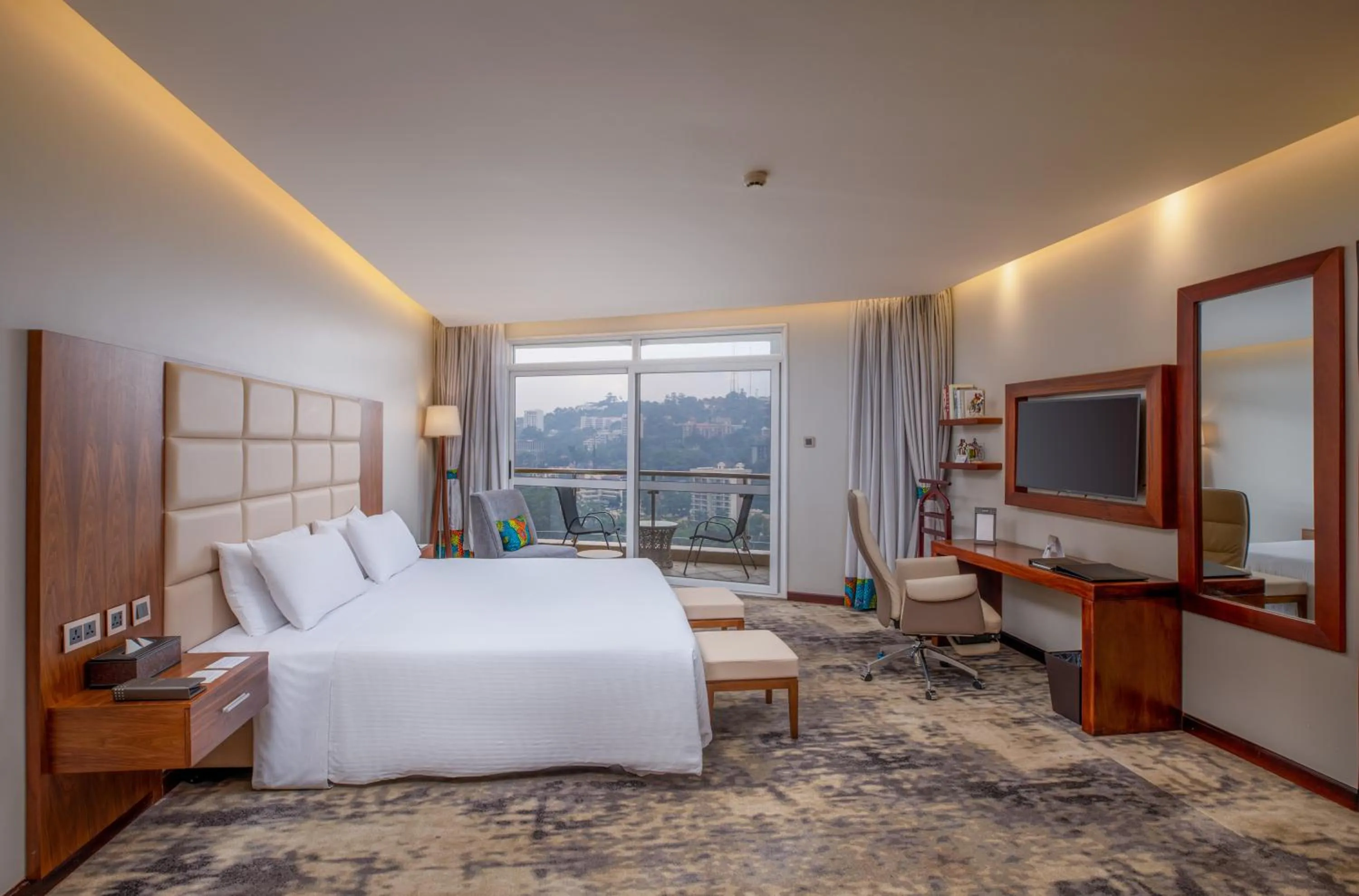 Communal lounge/ TV room in Golden Tulip Canaan Kampala