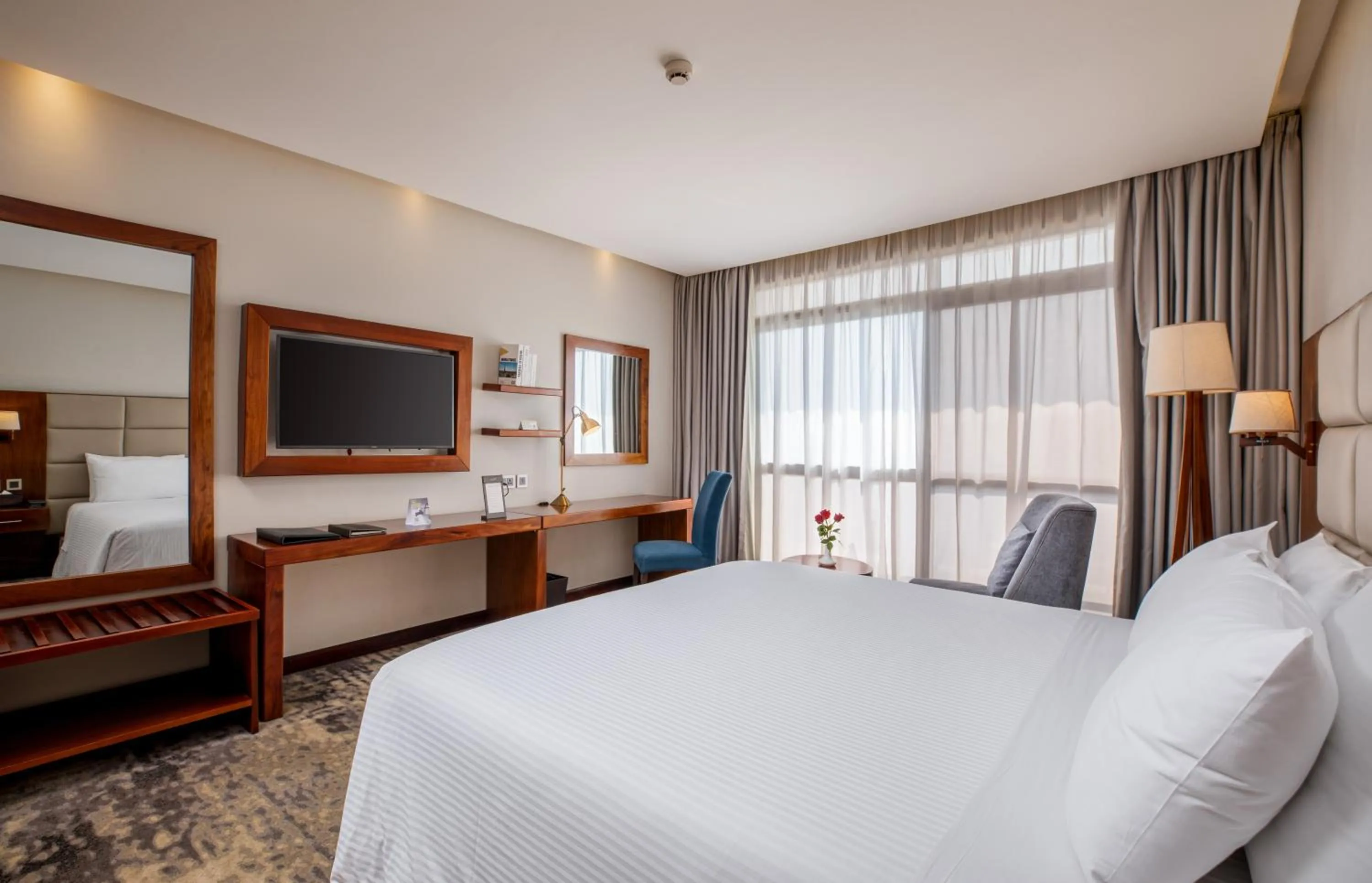 Bed in Golden Tulip Canaan Kampala